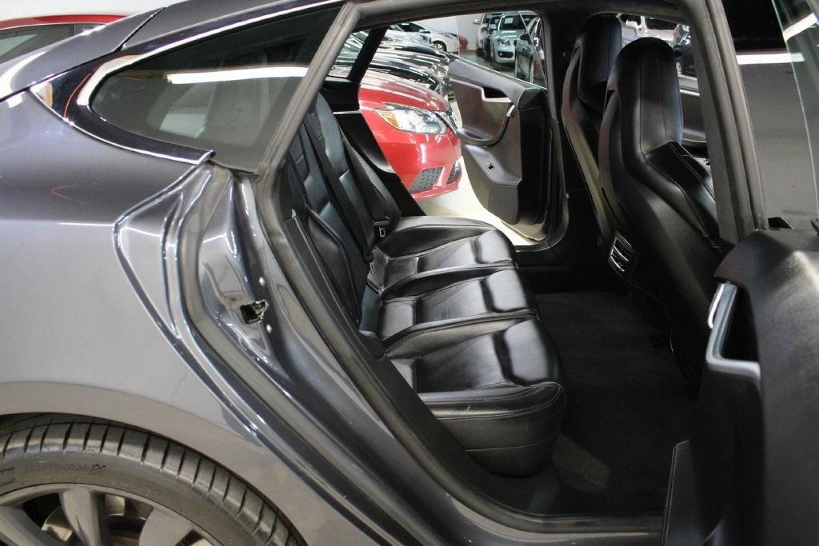 2014 Gray Metallic /Black Tesla Model S P85D (5YJSA1H21EF) with an Electric Motor engine, Automatic transmission, located at 15300 Midway Rd., Addison, TX, 75001, (972) 702-0011, 32.958321, -96.838074 - HOME OF THE NO HAGGLE PRICE - WHOLESALE PRICES TO THE PUBLIC!! Model S P85D, 4D Hatchback, 12-Cylinder Electric ZEV 691hp, 1-Speed Automatic, AWD, Gray, Leather.<br><br>Gray 2014 Tesla Model S P85D<br><br>86/94 City/Highway MPG<br><br><br>At Midway Auto Group, we strive to provide you with the best - Photo#13