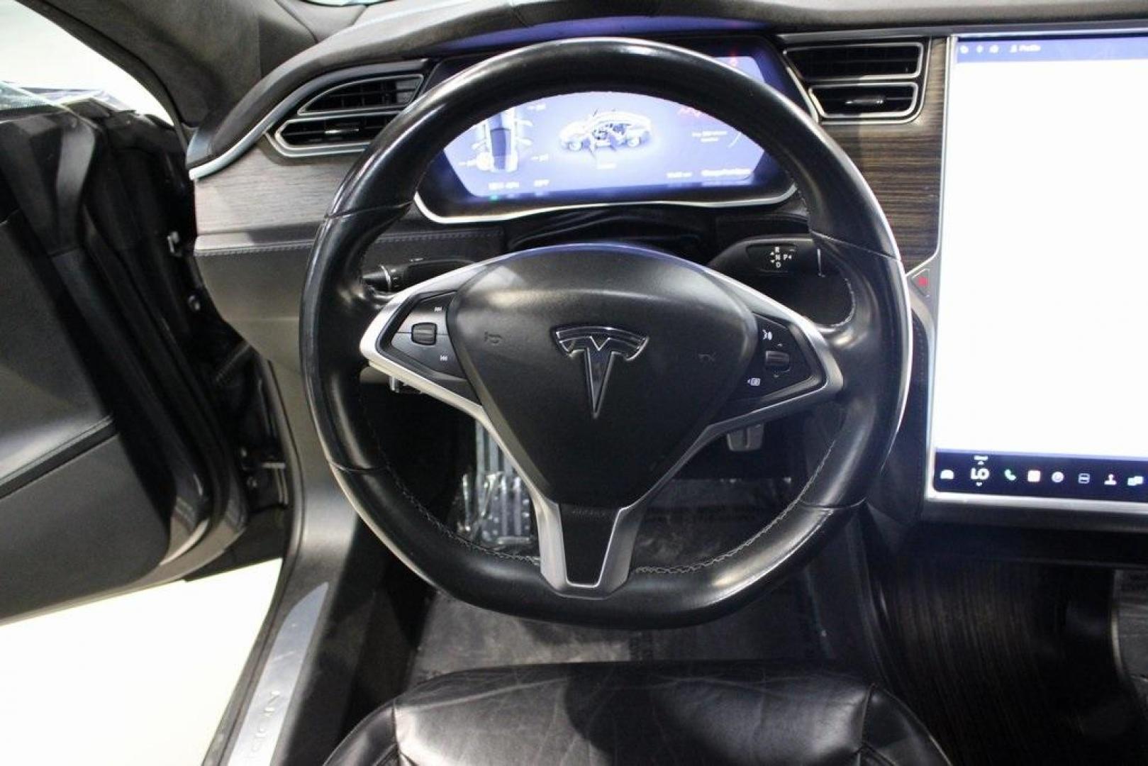 2014 Gray Metallic /Black Tesla Model S P85D (5YJSA1H21EF) with an Electric Motor engine, Automatic transmission, located at 15300 Midway Rd., Addison, TX, 75001, (972) 702-0011, 32.958321, -96.838074 - HOME OF THE NO HAGGLE PRICE - WHOLESALE PRICES TO THE PUBLIC!! Model S P85D, 4D Hatchback, 12-Cylinder Electric ZEV 691hp, 1-Speed Automatic, AWD, Gray, Leather.<br><br>Gray 2014 Tesla Model S P85D<br><br>86/94 City/Highway MPG<br><br><br>At Midway Auto Group, we strive to provide you with the best - Photo#16