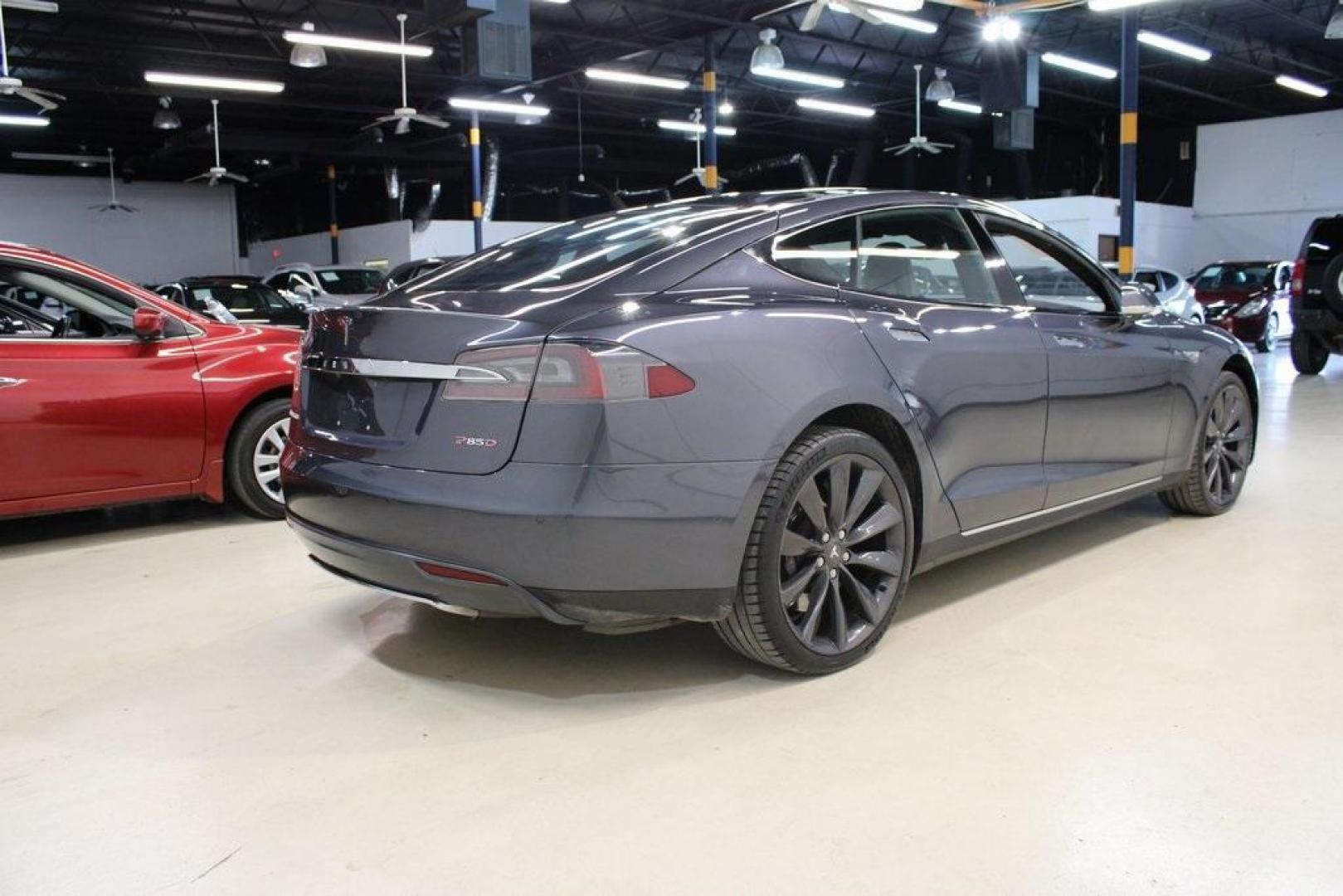 2014 Gray Metallic /Black Tesla Model S P85D (5YJSA1H21EF) with an Electric Motor engine, Automatic transmission, located at 15300 Midway Rd., Addison, TX, 75001, (972) 702-0011, 32.958321, -96.838074 - HOME OF THE NO HAGGLE PRICE - WHOLESALE PRICES TO THE PUBLIC!! Model S P85D, 4D Hatchback, 12-Cylinder Electric ZEV 691hp, 1-Speed Automatic, AWD, Gray, Leather.<br><br>Gray 2014 Tesla Model S P85D<br><br>86/94 City/Highway MPG<br><br><br>At Midway Auto Group, we strive to provide you with the best - Photo#1