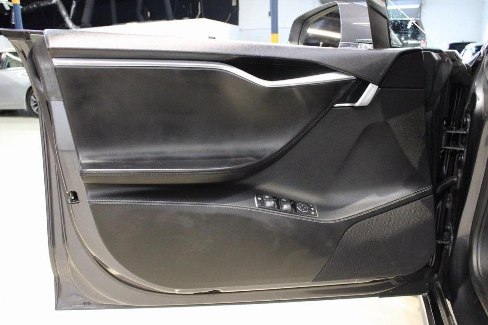2014 Gray Metallic /Black Tesla Model S P85D (5YJSA1H21EF) with an Electric Motor engine, Automatic transmission, located at 15300 Midway Rd., Addison, TX, 75001, (972) 702-0011, 32.958321, -96.838074 - HOME OF THE NO HAGGLE PRICE - WHOLESALE PRICES TO THE PUBLIC!! Model S P85D, 4D Hatchback, 12-Cylinder Electric ZEV 691hp, 1-Speed Automatic, AWD, Gray, Leather.<br><br>Gray 2014 Tesla Model S P85D<br><br>86/94 City/Highway MPG<br><br><br>At Midway Auto Group, we strive to provide you with the best - Photo#28