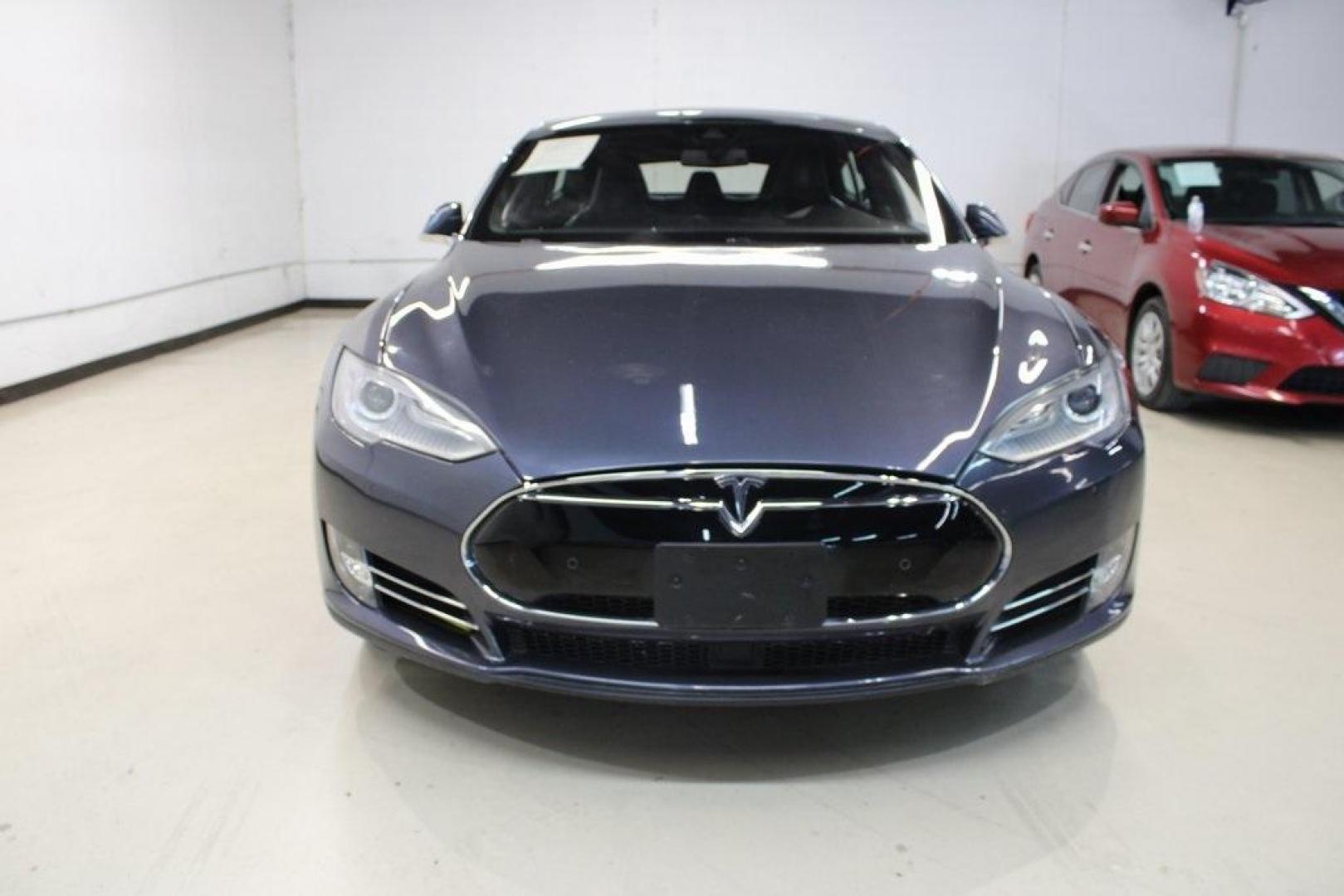 2014 Gray Metallic /Black Tesla Model S P85D (5YJSA1H21EF) with an Electric Motor engine, Automatic transmission, located at 15300 Midway Rd., Addison, TX, 75001, (972) 702-0011, 32.958321, -96.838074 - HOME OF THE NO HAGGLE PRICE - WHOLESALE PRICES TO THE PUBLIC!! Model S P85D, 4D Hatchback, 12-Cylinder Electric ZEV 691hp, 1-Speed Automatic, AWD, Gray, Leather.<br><br>Gray 2014 Tesla Model S P85D<br><br>86/94 City/Highway MPG<br><br><br>At Midway Auto Group, we strive to provide you with the best - Photo#4