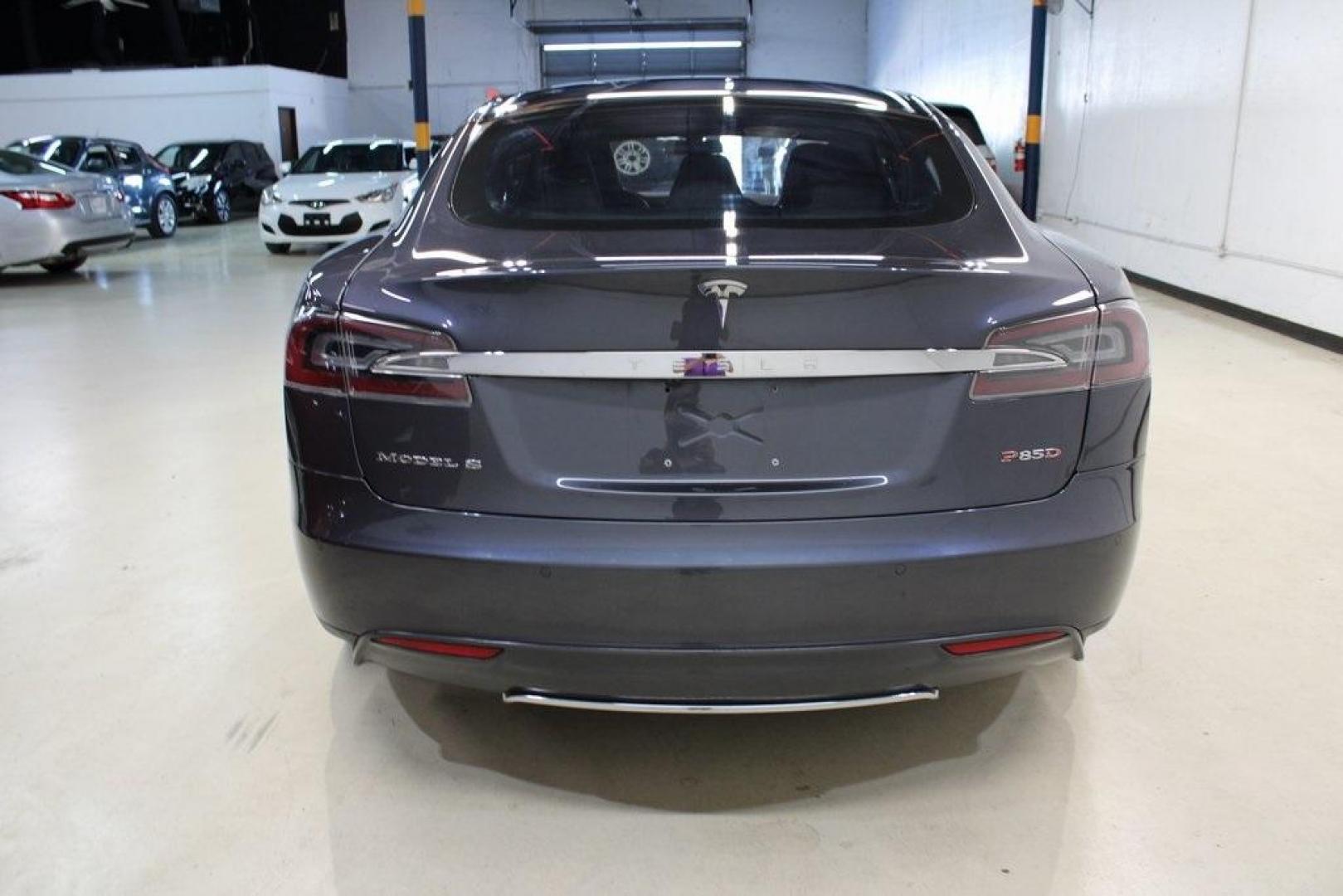 2014 Gray Metallic /Black Tesla Model S P85D (5YJSA1H21EF) with an Electric Motor engine, Automatic transmission, located at 15300 Midway Rd., Addison, TX, 75001, (972) 702-0011, 32.958321, -96.838074 - HOME OF THE NO HAGGLE PRICE - WHOLESALE PRICES TO THE PUBLIC!! Model S P85D, 4D Hatchback, 12-Cylinder Electric ZEV 691hp, 1-Speed Automatic, AWD, Gray, Leather.<br><br>Gray 2014 Tesla Model S P85D<br><br>86/94 City/Highway MPG<br><br><br>At Midway Auto Group, we strive to provide you with the best - Photo#5