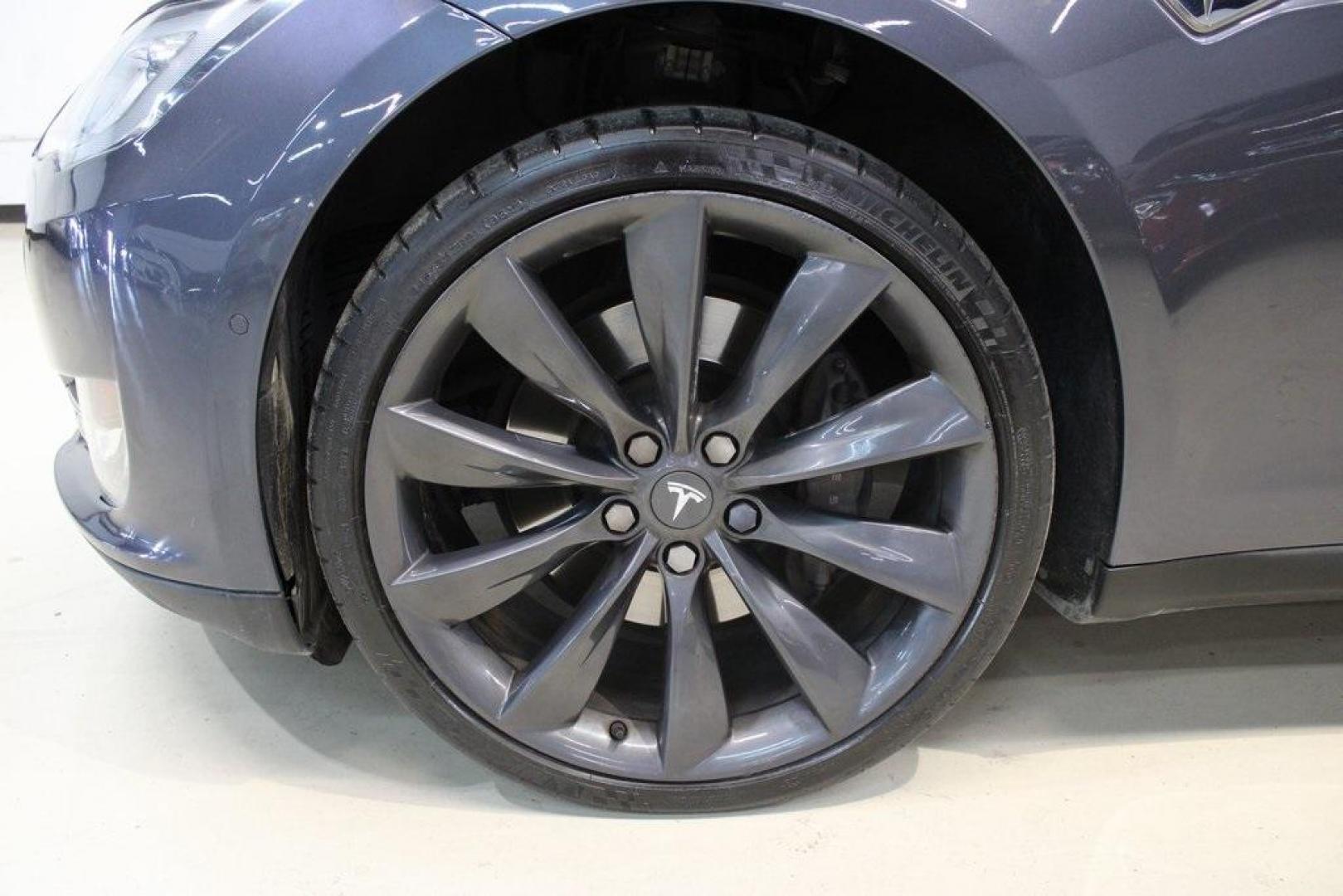 2014 Gray Metallic /Black Tesla Model S P85D (5YJSA1H21EF) with an Electric Motor engine, Automatic transmission, located at 15300 Midway Rd., Addison, TX, 75001, (972) 702-0011, 32.958321, -96.838074 - HOME OF THE NO HAGGLE PRICE - WHOLESALE PRICES TO THE PUBLIC!! Model S P85D, 4D Hatchback, 12-Cylinder Electric ZEV 691hp, 1-Speed Automatic, AWD, Gray, Leather.<br><br>Gray 2014 Tesla Model S P85D<br><br>86/94 City/Highway MPG<br><br><br>At Midway Auto Group, we strive to provide you with the best - Photo#6