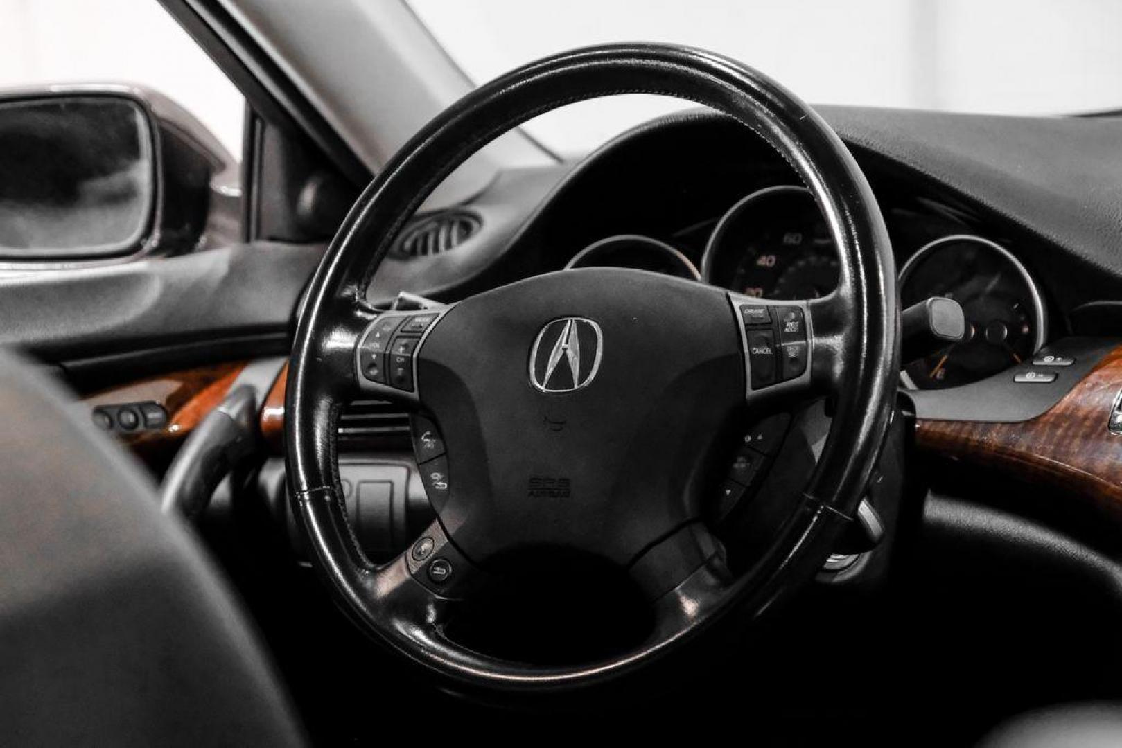 2010 Grigio Metallic /Parchment In Acura RL 3.7 (JH4KB2F56AC) with an 3.7L V6 SOHC VTEC engine, Automatic transmission, located at 15300 Midway Rd., Addison, TX, 75001, (972) 702-0011, 32.958321, -96.838074 - Photo#16