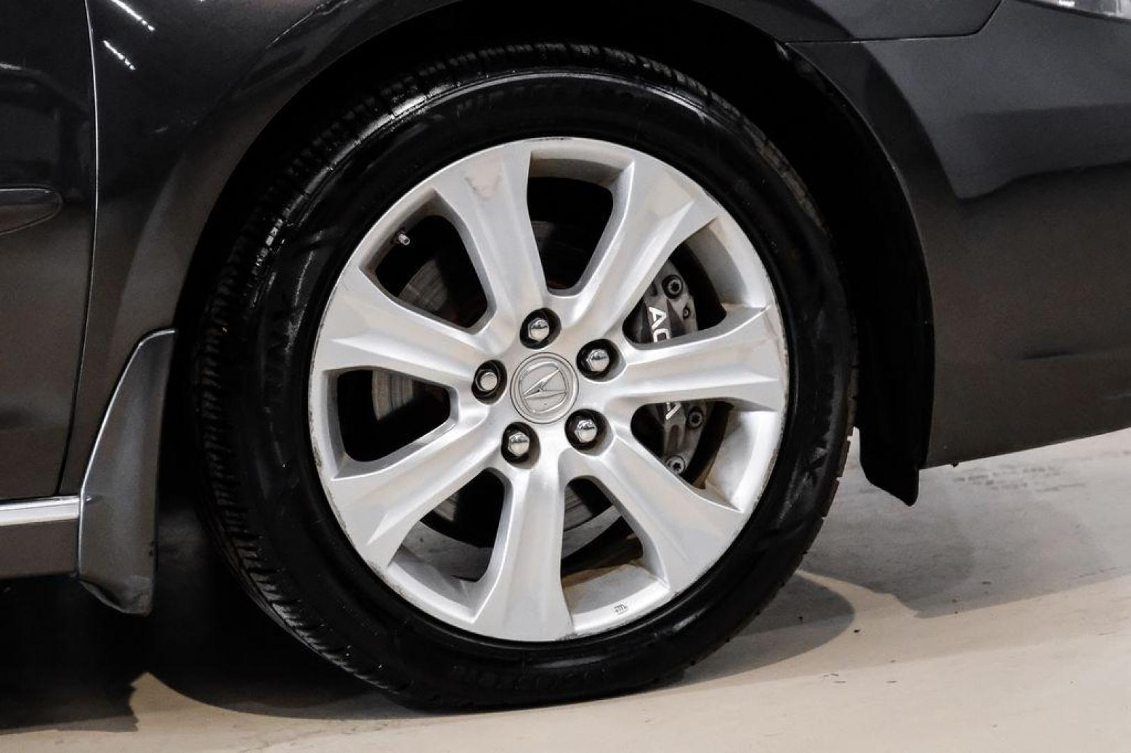 2010 Grigio Metallic /Parchment In Acura RL 3.7 (JH4KB2F56AC) with an 3.7L V6 SOHC VTEC engine, Automatic transmission, located at 15300 Midway Rd., Addison, TX, 75001, (972) 702-0011, 32.958321, -96.838074 - Photo#53