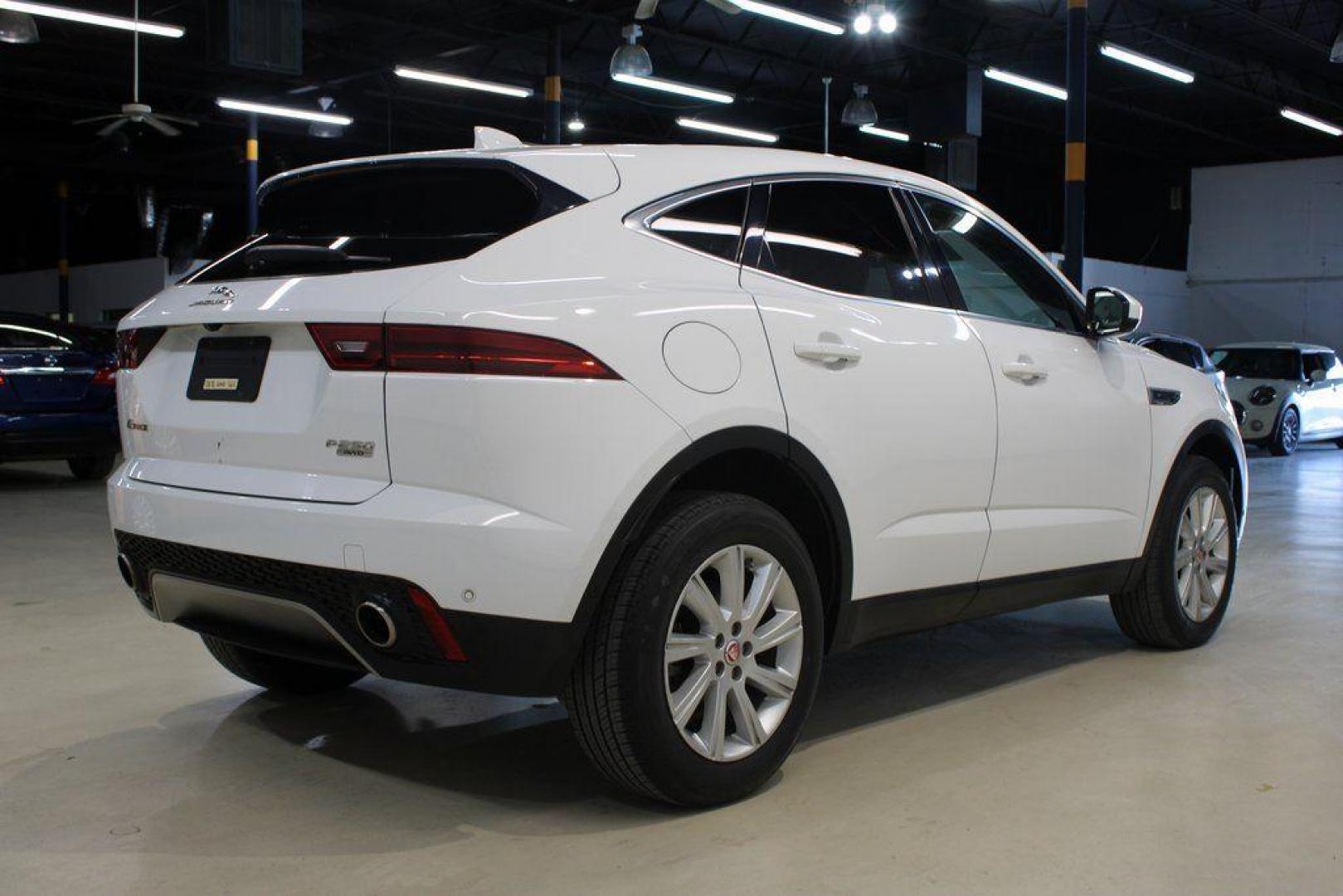 2018 Fuji White /Ebony/Ebony Jaguar E-PACE S (SADFJ2FX2J1) with an 2.0L I4 Turbocharged engine, Automatic transmission, located at 15300 Midway Rd., Addison, TX, 75001, (972) 702-0011, 32.958321, -96.838074 - HOME OF THE NO HAGGLE PRICE - WHOLESALE PRICES TO THE PUBLIC!! non smoker, E-PACE S, 4D Sport Utility, 2.0L I4 Turbocharged, 9-Speed Automatic, AWD, White, Ebony/Ebony Leather.<br><br>White 2018 Jaguar E-PACE S<br><br>21/28 City/Highway MPG<br><br>Awards:<br> * 2018 KBB.com Brand Image Awards<br><b - Photo#2