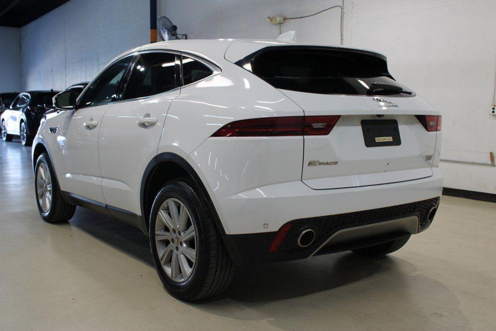 2018 Fuji White /Ebony/Ebony Jaguar E-PACE S (SADFJ2FX2J1) with an 2.0L I4 Turbocharged engine, Automatic transmission, located at 15300 Midway Rd., Addison, TX, 75001, (972) 702-0011, 32.958321, -96.838074 - HOME OF THE NO HAGGLE PRICE - WHOLESALE PRICES TO THE PUBLIC!! non smoker, E-PACE S, 4D Sport Utility, 2.0L I4 Turbocharged, 9-Speed Automatic, AWD, White, Ebony/Ebony Leather.<br><br>White 2018 Jaguar E-PACE S<br><br>21/28 City/Highway MPG<br><br>Awards:<br> * 2018 KBB.com Brand Image Awards<br><b - Photo#3