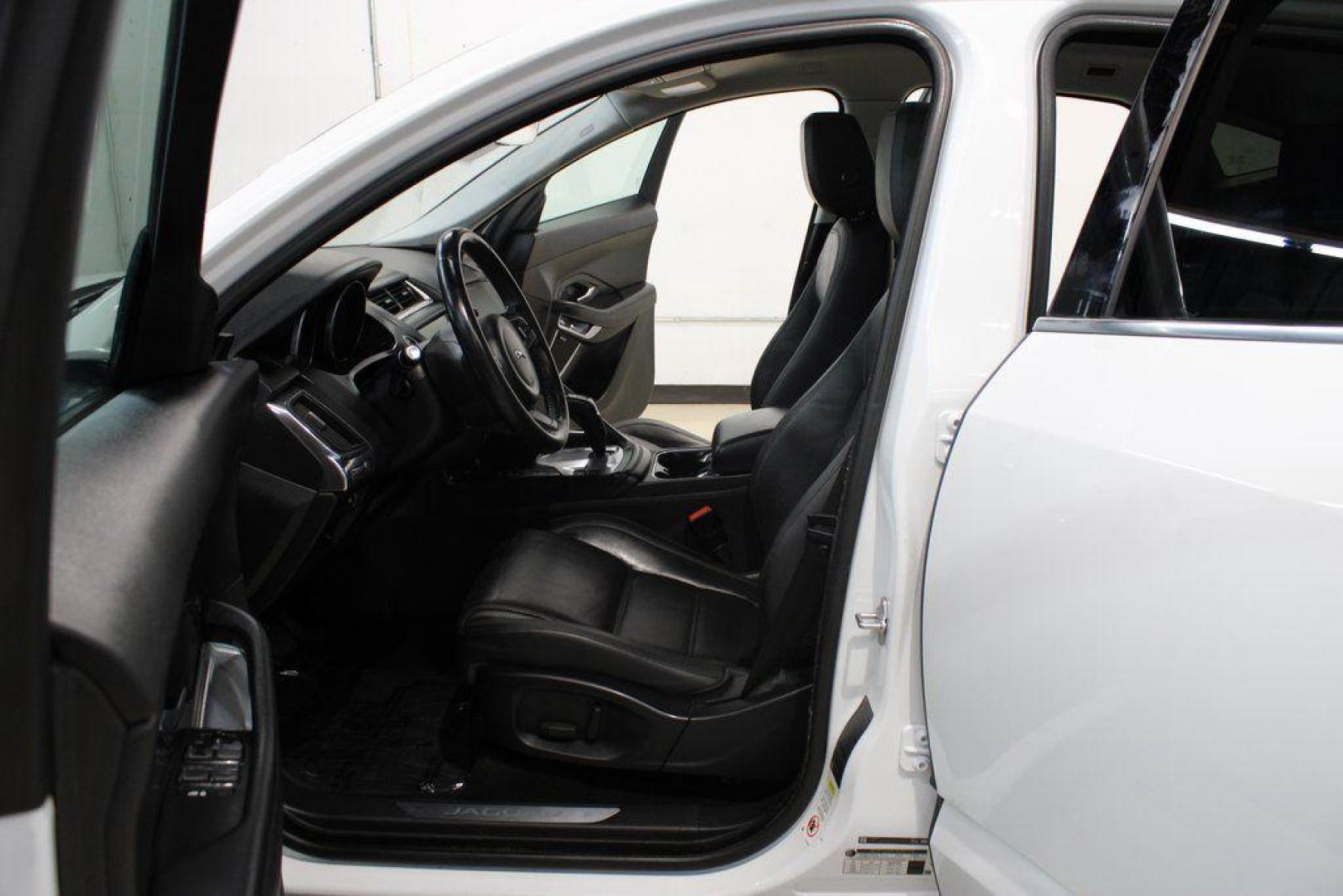 2018 Fuji White /Ebony/Ebony Jaguar E-PACE S (SADFJ2FX2J1) with an 2.0L I4 Turbocharged engine, Automatic transmission, located at 15300 Midway Rd., Addison, TX, 75001, (972) 702-0011, 32.958321, -96.838074 - HOME OF THE NO HAGGLE PRICE - WHOLESALE PRICES TO THE PUBLIC!! non smoker, E-PACE S, 4D Sport Utility, 2.0L I4 Turbocharged, 9-Speed Automatic, AWD, White, Ebony/Ebony Leather.<br><br>White 2018 Jaguar E-PACE S<br><br>21/28 City/Highway MPG<br><br>Awards:<br> * 2018 KBB.com Brand Image Awards<br><b - Photo#14