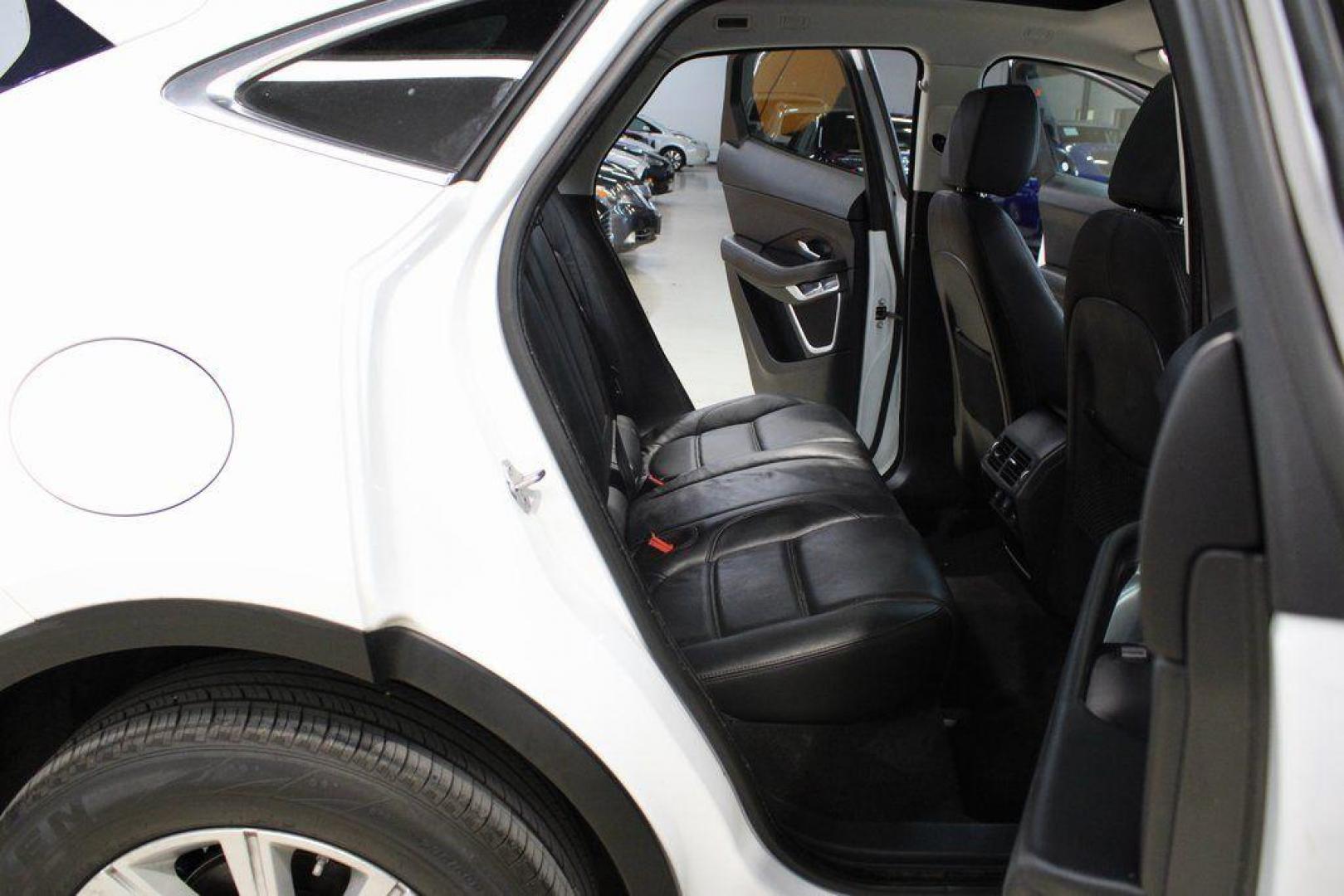2018 Fuji White /Ebony/Ebony Jaguar E-PACE S (SADFJ2FX2J1) with an 2.0L I4 Turbocharged engine, Automatic transmission, located at 15300 Midway Rd., Addison, TX, 75001, (972) 702-0011, 32.958321, -96.838074 - HOME OF THE NO HAGGLE PRICE - WHOLESALE PRICES TO THE PUBLIC!! non smoker, E-PACE S, 4D Sport Utility, 2.0L I4 Turbocharged, 9-Speed Automatic, AWD, White, Ebony/Ebony Leather.<br><br>White 2018 Jaguar E-PACE S<br><br>21/28 City/Highway MPG<br><br>Awards:<br> * 2018 KBB.com Brand Image Awards<br><b - Photo#16