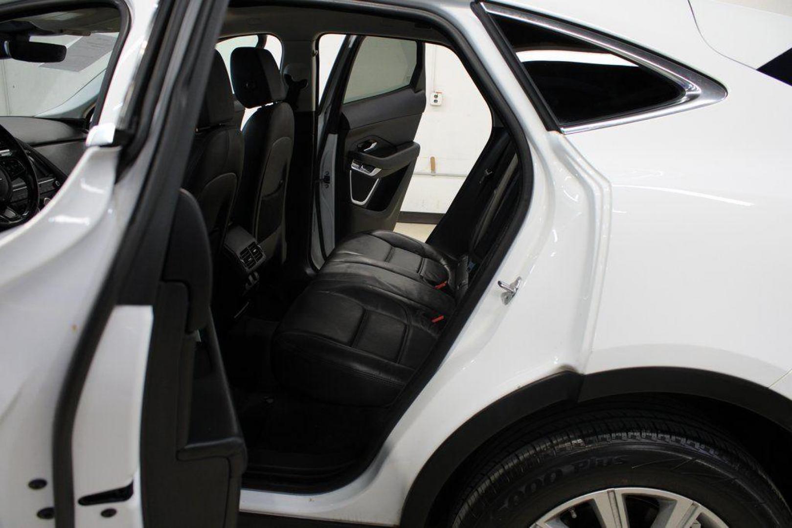 2018 Fuji White /Ebony/Ebony Jaguar E-PACE S (SADFJ2FX2J1) with an 2.0L I4 Turbocharged engine, Automatic transmission, located at 15300 Midway Rd., Addison, TX, 75001, (972) 702-0011, 32.958321, -96.838074 - HOME OF THE NO HAGGLE PRICE - WHOLESALE PRICES TO THE PUBLIC!! non smoker, E-PACE S, 4D Sport Utility, 2.0L I4 Turbocharged, 9-Speed Automatic, AWD, White, Ebony/Ebony Leather.<br><br>White 2018 Jaguar E-PACE S<br><br>21/28 City/Highway MPG<br><br>Awards:<br> * 2018 KBB.com Brand Image Awards<br><b - Photo#17
