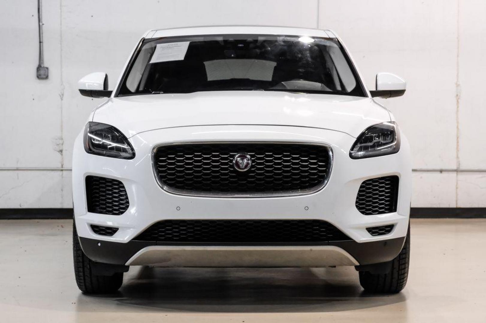 2018 Fuji White /Ebony/Ebony Jaguar E-PACE S (SADFJ2FX2J1) with an 2.0L I4 Turbocharged engine, Automatic transmission, located at 15300 Midway Rd., Addison, TX, 75001, (972) 702-0011, 32.958321, -96.838074 - HOME OF THE NO HAGGLE PRICE - WHOLESALE PRICES TO THE PUBLIC!! non smoker, E-PACE S, 4D Sport Utility, 2.0L I4 Turbocharged, 9-Speed Automatic, AWD, White, Ebony/Ebony Leather.<br><br>White 2018 Jaguar E-PACE S<br><br>21/28 City/Highway MPG<br><br>Awards:<br> * 2018 KBB.com Brand Image Awards<br><b - Photo#5