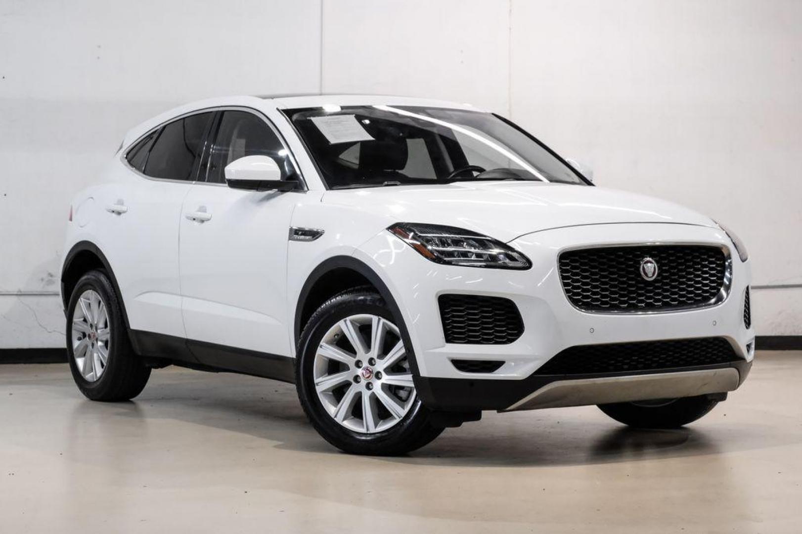 2018 Fuji White /Ebony/Ebony Jaguar E-PACE S (SADFJ2FX2J1) with an 2.0L I4 Turbocharged engine, Automatic transmission, located at 15300 Midway Rd., Addison, TX, 75001, (972) 702-0011, 32.958321, -96.838074 - HOME OF THE NO HAGGLE PRICE - WHOLESALE PRICES TO THE PUBLIC!! non smoker, E-PACE S, 4D Sport Utility, 2.0L I4 Turbocharged, 9-Speed Automatic, AWD, White, Ebony/Ebony Leather.<br><br>White 2018 Jaguar E-PACE S<br><br>21/28 City/Highway MPG<br><br>Awards:<br> * 2018 KBB.com Brand Image Awards<br><b - Photo#6
