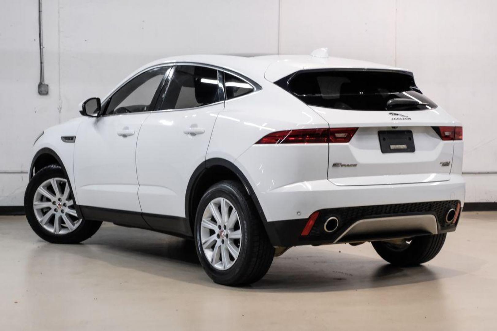 2018 Fuji White /Ebony/Ebony Jaguar E-PACE S (SADFJ2FX2J1) with an 2.0L I4 Turbocharged engine, Automatic transmission, located at 15300 Midway Rd., Addison, TX, 75001, (972) 702-0011, 32.958321, -96.838074 - HOME OF THE NO HAGGLE PRICE - WHOLESALE PRICES TO THE PUBLIC!! non smoker, E-PACE S, 4D Sport Utility, 2.0L I4 Turbocharged, 9-Speed Automatic, AWD, White, Ebony/Ebony Leather.<br><br>White 2018 Jaguar E-PACE S<br><br>21/28 City/Highway MPG<br><br>Awards:<br> * 2018 KBB.com Brand Image Awards<br><b - Photo#10