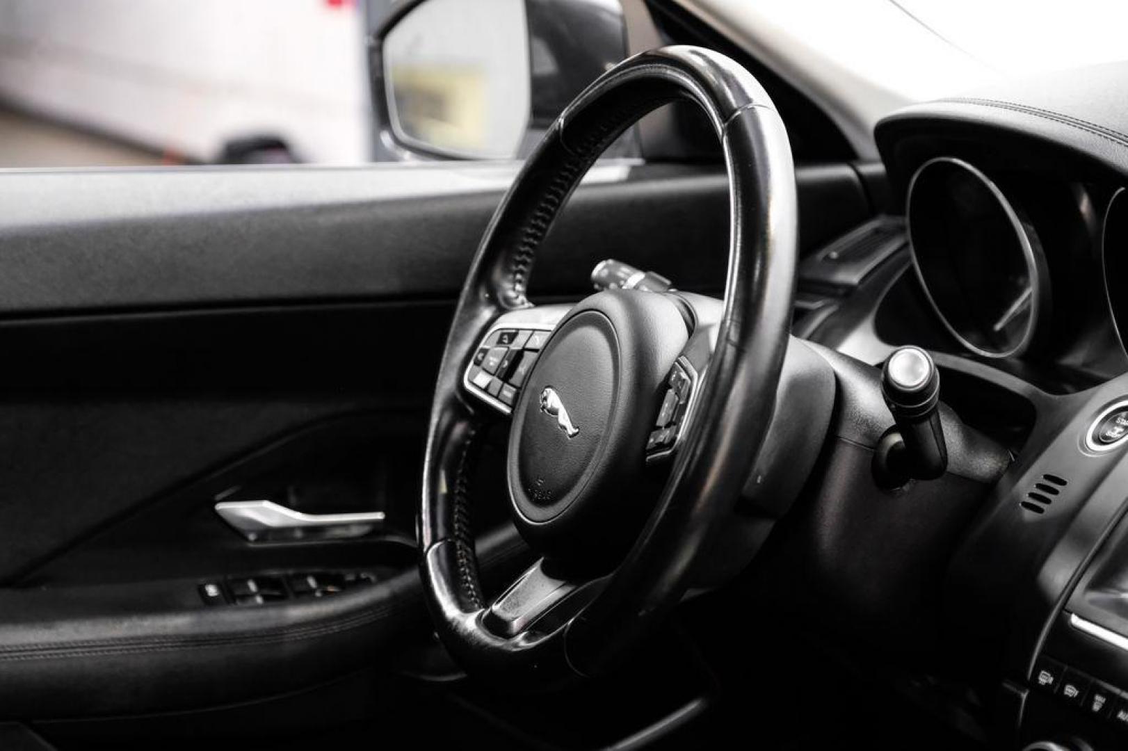 2018 Fuji White /Ebony/Ebony Jaguar E-PACE S (SADFJ2FX2J1) with an 2.0L I4 Turbocharged engine, Automatic transmission, located at 15300 Midway Rd., Addison, TX, 75001, (972) 702-0011, 32.958321, -96.838074 - HOME OF THE NO HAGGLE PRICE - WHOLESALE PRICES TO THE PUBLIC!! non smoker, E-PACE S, 4D Sport Utility, 2.0L I4 Turbocharged, 9-Speed Automatic, AWD, White, Ebony/Ebony Leather.<br><br>White 2018 Jaguar E-PACE S<br><br>21/28 City/Highway MPG<br><br>Awards:<br> * 2018 KBB.com Brand Image Awards<br><b - Photo#14