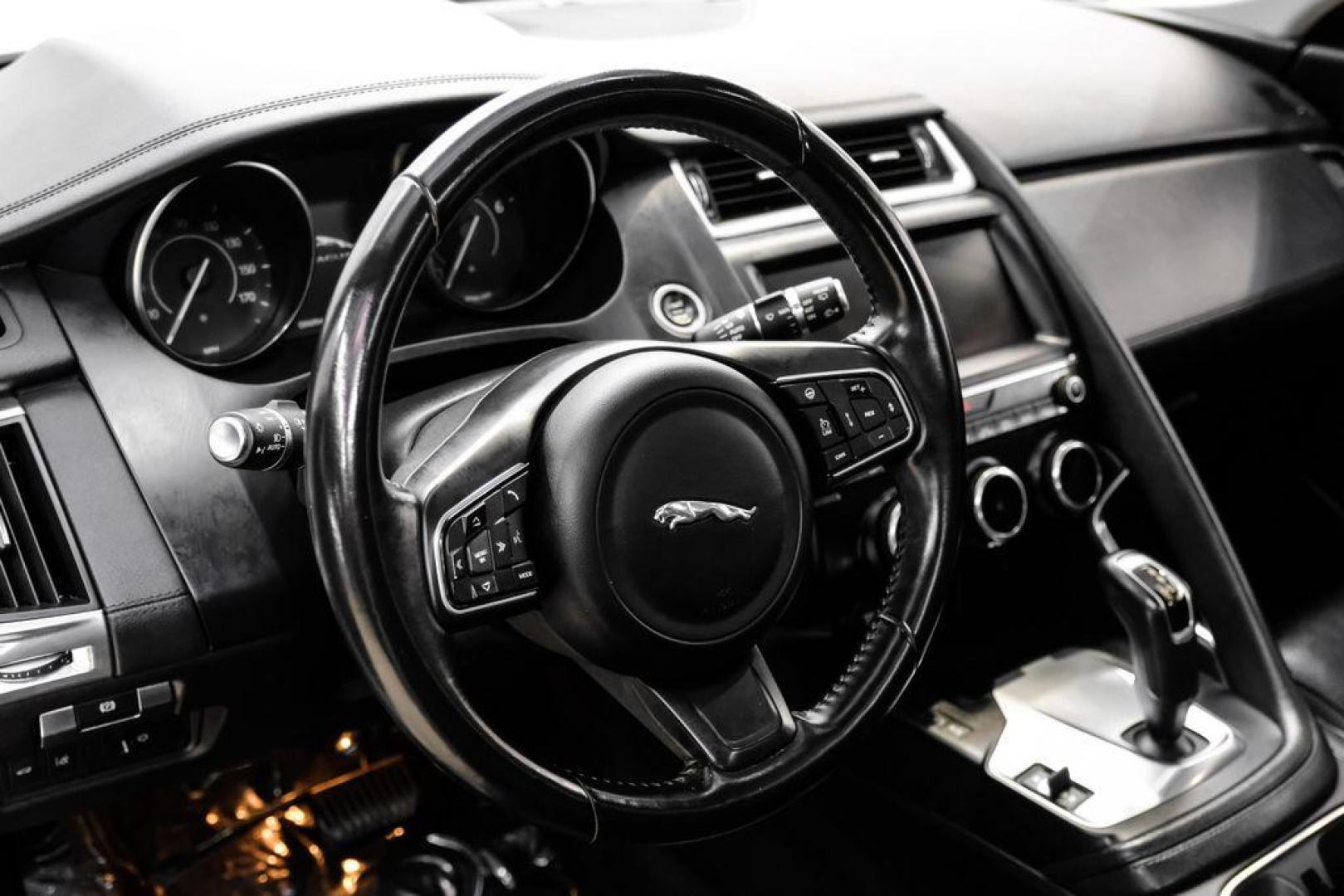 2018 Fuji White /Ebony/Ebony Jaguar E-PACE S (SADFJ2FX2J1) with an 2.0L I4 Turbocharged engine, Automatic transmission, located at 15300 Midway Rd., Addison, TX, 75001, (972) 702-0011, 32.958321, -96.838074 - HOME OF THE NO HAGGLE PRICE - WHOLESALE PRICES TO THE PUBLIC!! non smoker, E-PACE S, 4D Sport Utility, 2.0L I4 Turbocharged, 9-Speed Automatic, AWD, White, Ebony/Ebony Leather.<br><br>White 2018 Jaguar E-PACE S<br><br>21/28 City/Highway MPG<br><br>Awards:<br> * 2018 KBB.com Brand Image Awards<br><b - Photo#15