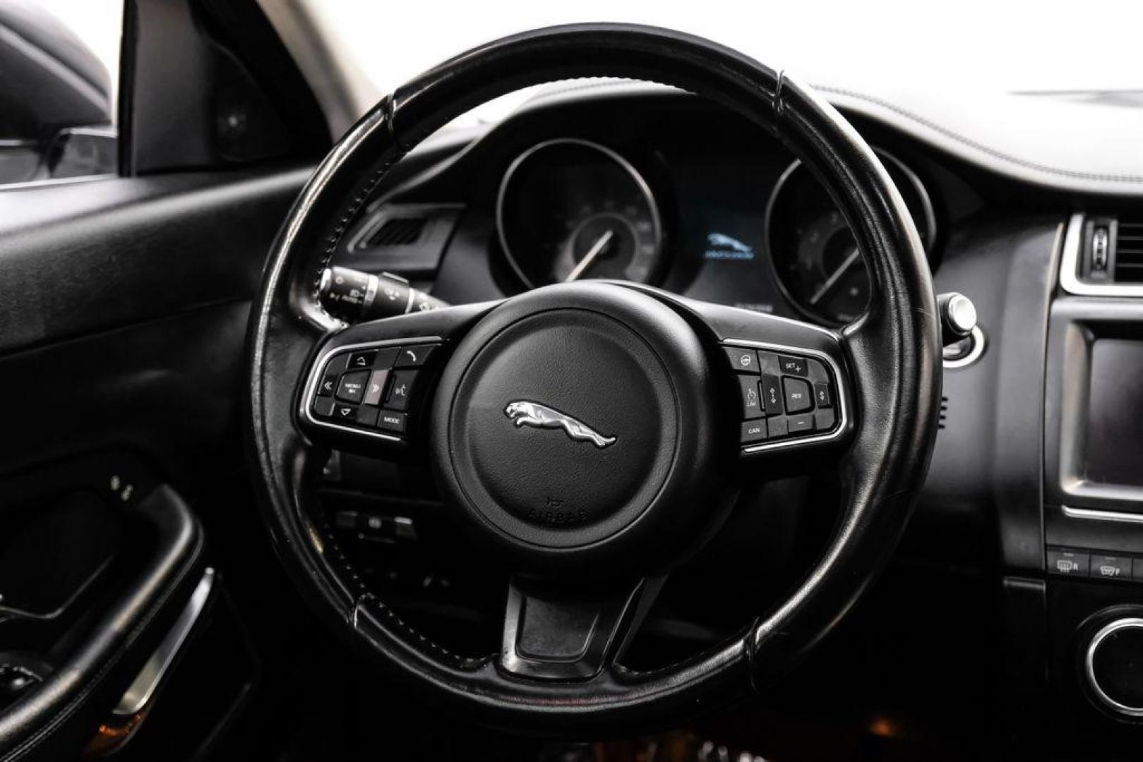 2018 Fuji White /Ebony/Ebony Jaguar E-PACE S (SADFJ2FX2J1) with an 2.0L I4 Turbocharged engine, Automatic transmission, located at 15300 Midway Rd., Addison, TX, 75001, (972) 702-0011, 32.958321, -96.838074 - HOME OF THE NO HAGGLE PRICE - WHOLESALE PRICES TO THE PUBLIC!! non smoker, E-PACE S, 4D Sport Utility, 2.0L I4 Turbocharged, 9-Speed Automatic, AWD, White, Ebony/Ebony Leather.<br><br>White 2018 Jaguar E-PACE S<br><br>21/28 City/Highway MPG<br><br>Awards:<br> * 2018 KBB.com Brand Image Awards<br><b - Photo#16