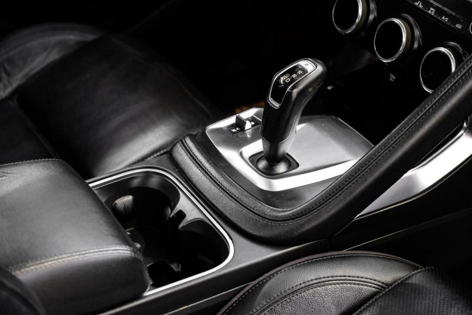 2018 Fuji White /Ebony/Ebony Jaguar E-PACE S (SADFJ2FX2J1) with an 2.0L I4 Turbocharged engine, Automatic transmission, located at 15300 Midway Rd., Addison, TX, 75001, (972) 702-0011, 32.958321, -96.838074 - HOME OF THE NO HAGGLE PRICE - WHOLESALE PRICES TO THE PUBLIC!! non smoker, E-PACE S, 4D Sport Utility, 2.0L I4 Turbocharged, 9-Speed Automatic, AWD, White, Ebony/Ebony Leather.<br><br>White 2018 Jaguar E-PACE S<br><br>21/28 City/Highway MPG<br><br>Awards:<br> * 2018 KBB.com Brand Image Awards<br><b - Photo#23