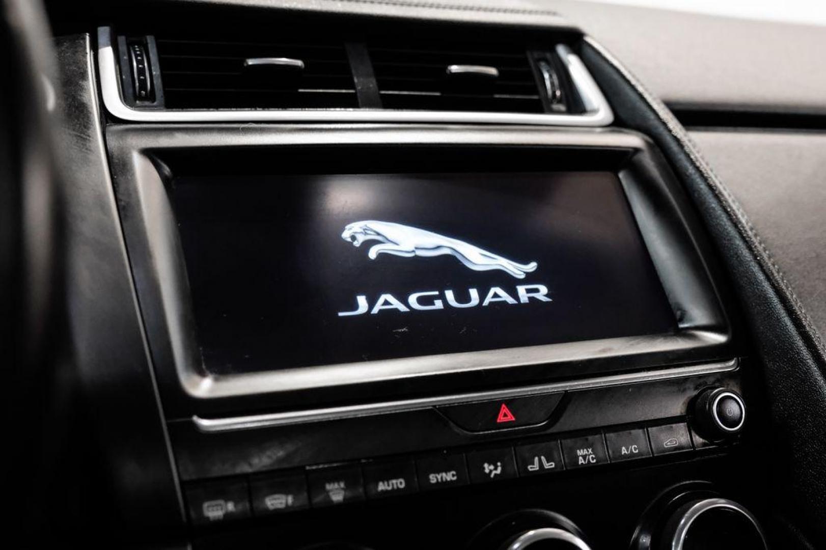 2018 Fuji White /Ebony/Ebony Jaguar E-PACE S (SADFJ2FX2J1) with an 2.0L I4 Turbocharged engine, Automatic transmission, located at 15300 Midway Rd., Addison, TX, 75001, (972) 702-0011, 32.958321, -96.838074 - HOME OF THE NO HAGGLE PRICE - WHOLESALE PRICES TO THE PUBLIC!! non smoker, E-PACE S, 4D Sport Utility, 2.0L I4 Turbocharged, 9-Speed Automatic, AWD, White, Ebony/Ebony Leather.<br><br>White 2018 Jaguar E-PACE S<br><br>21/28 City/Highway MPG<br><br>Awards:<br> * 2018 KBB.com Brand Image Awards<br><b - Photo#26