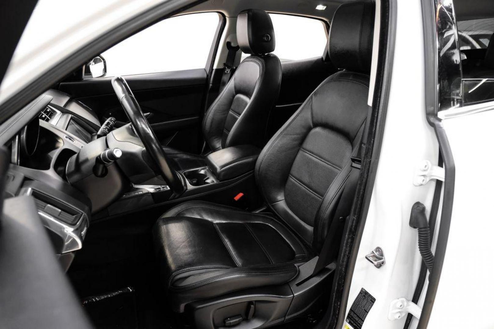2018 Fuji White /Ebony/Ebony Jaguar E-PACE S (SADFJ2FX2J1) with an 2.0L I4 Turbocharged engine, Automatic transmission, located at 15300 Midway Rd., Addison, TX, 75001, (972) 702-0011, 32.958321, -96.838074 - HOME OF THE NO HAGGLE PRICE - WHOLESALE PRICES TO THE PUBLIC!! non smoker, E-PACE S, 4D Sport Utility, 2.0L I4 Turbocharged, 9-Speed Automatic, AWD, White, Ebony/Ebony Leather.<br><br>White 2018 Jaguar E-PACE S<br><br>21/28 City/Highway MPG<br><br>Awards:<br> * 2018 KBB.com Brand Image Awards<br><b - Photo#30