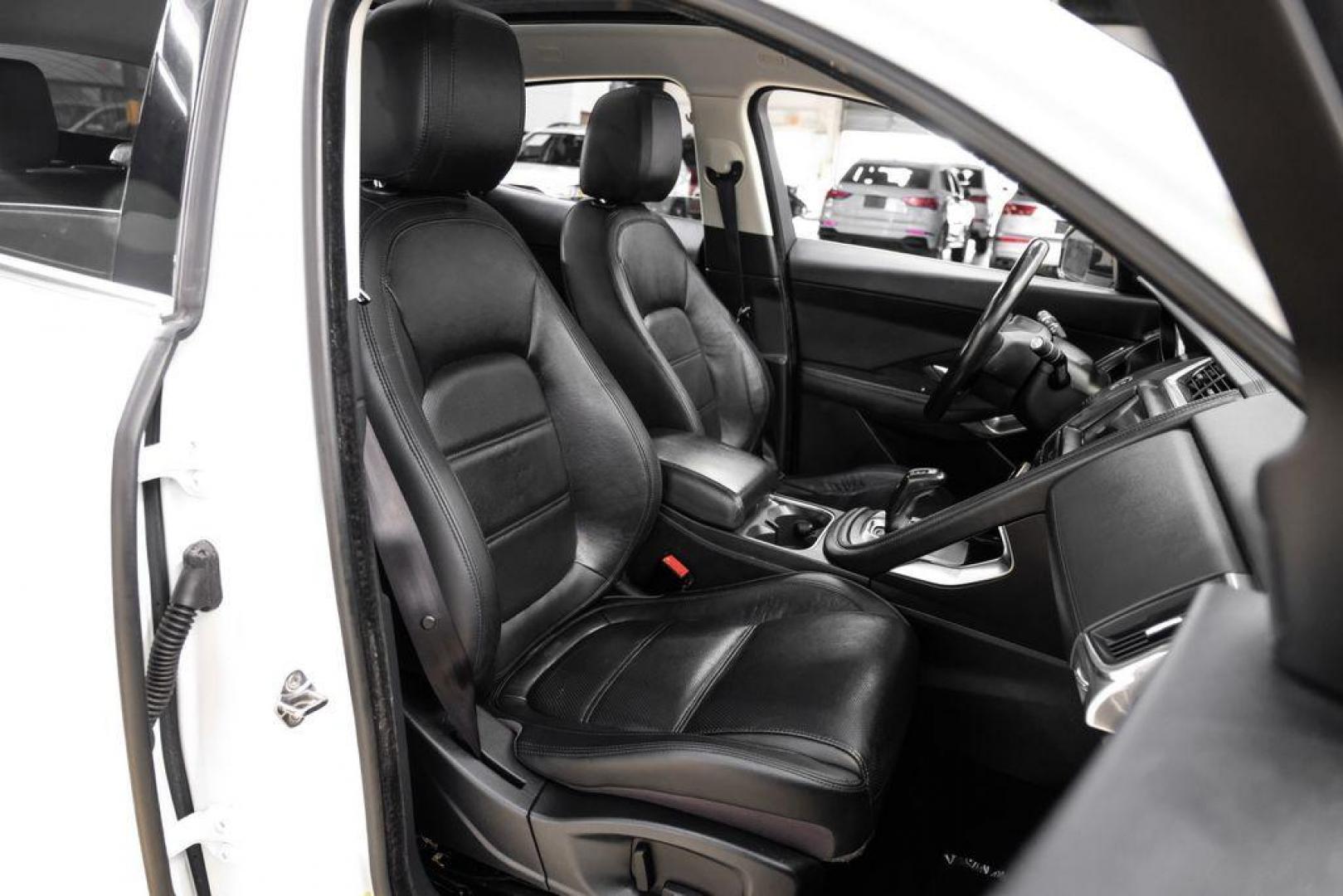 2018 Fuji White /Ebony/Ebony Jaguar E-PACE S (SADFJ2FX2J1) with an 2.0L I4 Turbocharged engine, Automatic transmission, located at 15300 Midway Rd., Addison, TX, 75001, (972) 702-0011, 32.958321, -96.838074 - HOME OF THE NO HAGGLE PRICE - WHOLESALE PRICES TO THE PUBLIC!! non smoker, E-PACE S, 4D Sport Utility, 2.0L I4 Turbocharged, 9-Speed Automatic, AWD, White, Ebony/Ebony Leather.<br><br>White 2018 Jaguar E-PACE S<br><br>21/28 City/Highway MPG<br><br>Awards:<br> * 2018 KBB.com Brand Image Awards<br><b - Photo#31