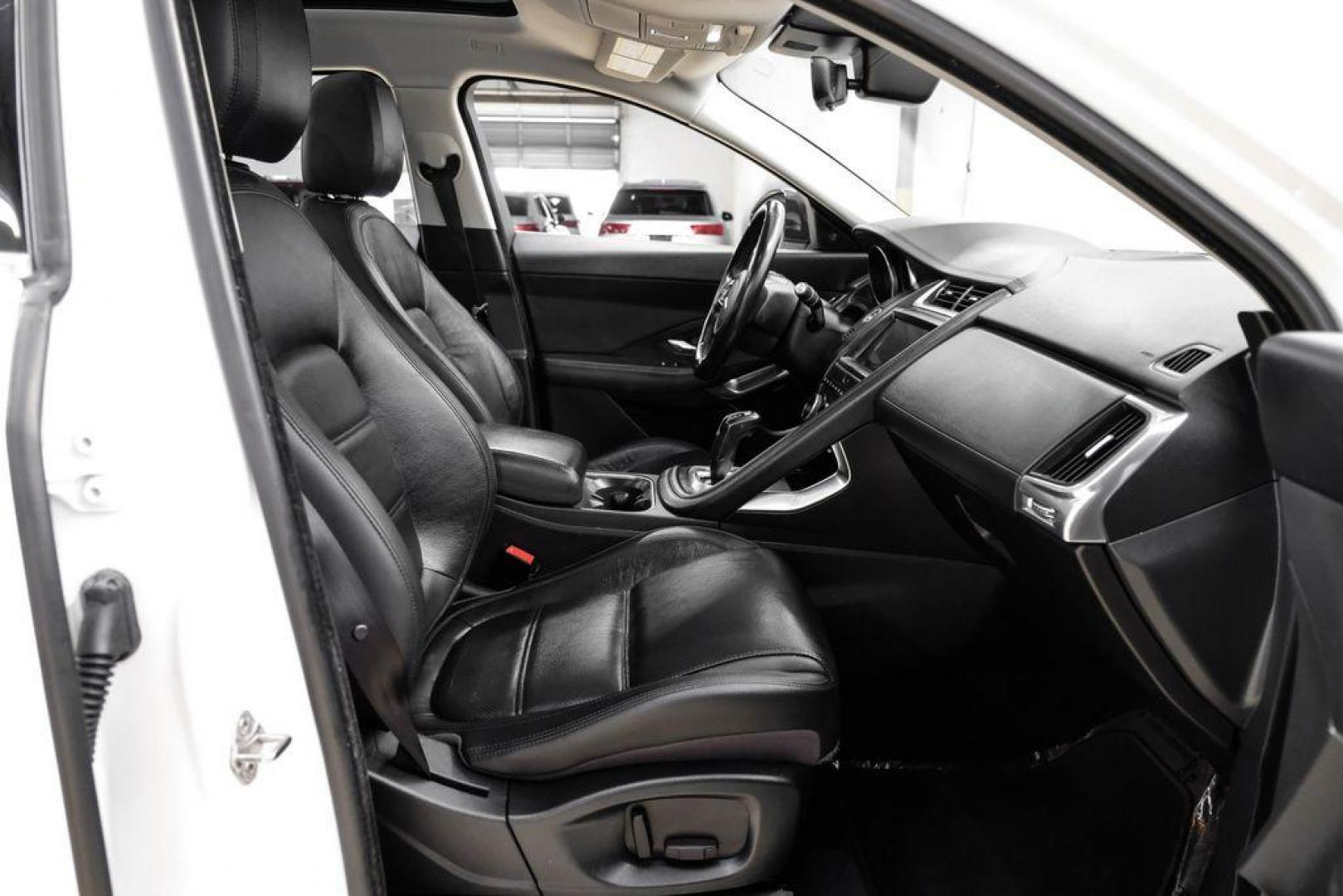 2018 Fuji White /Ebony/Ebony Jaguar E-PACE S (SADFJ2FX2J1) with an 2.0L I4 Turbocharged engine, Automatic transmission, located at 15300 Midway Rd., Addison, TX, 75001, (972) 702-0011, 32.958321, -96.838074 - HOME OF THE NO HAGGLE PRICE - WHOLESALE PRICES TO THE PUBLIC!! non smoker, E-PACE S, 4D Sport Utility, 2.0L I4 Turbocharged, 9-Speed Automatic, AWD, White, Ebony/Ebony Leather.<br><br>White 2018 Jaguar E-PACE S<br><br>21/28 City/Highway MPG<br><br>Awards:<br> * 2018 KBB.com Brand Image Awards<br><b - Photo#32