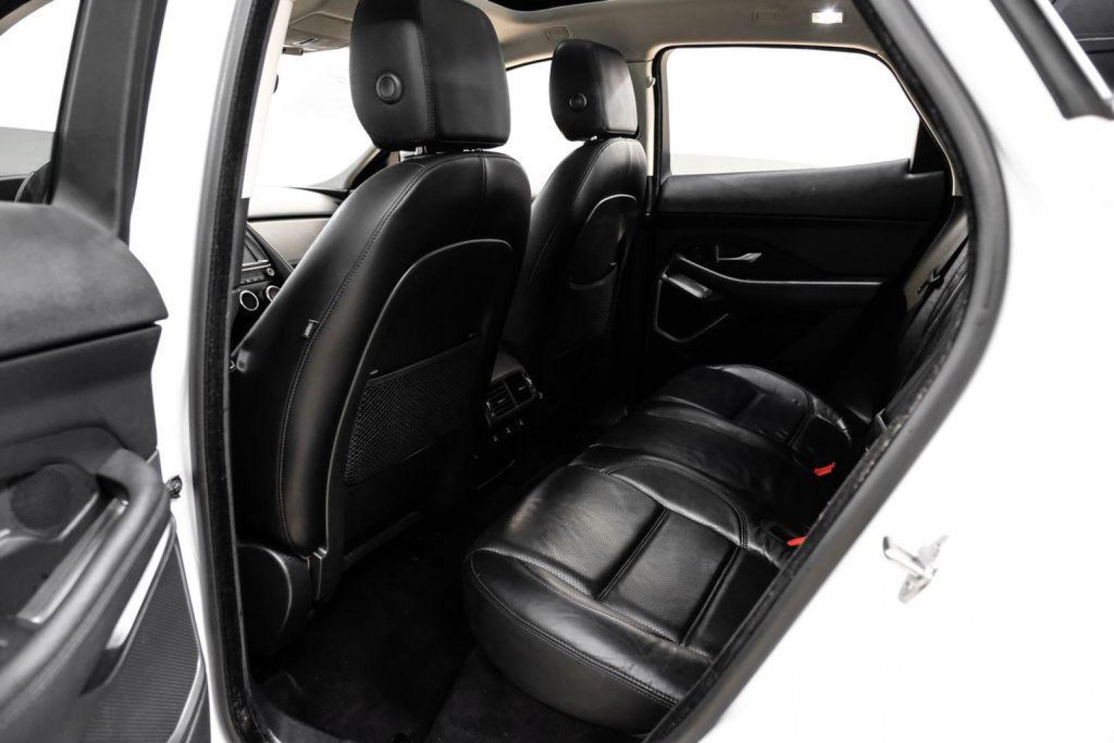 2018 Fuji White /Ebony/Ebony Jaguar E-PACE S (SADFJ2FX2J1) with an 2.0L I4 Turbocharged engine, Automatic transmission, located at 15300 Midway Rd., Addison, TX, 75001, (972) 702-0011, 32.958321, -96.838074 - HOME OF THE NO HAGGLE PRICE - WHOLESALE PRICES TO THE PUBLIC!! non smoker, E-PACE S, 4D Sport Utility, 2.0L I4 Turbocharged, 9-Speed Automatic, AWD, White, Ebony/Ebony Leather.<br><br>White 2018 Jaguar E-PACE S<br><br>21/28 City/Highway MPG<br><br>Awards:<br> * 2018 KBB.com Brand Image Awards<br><b - Photo#35