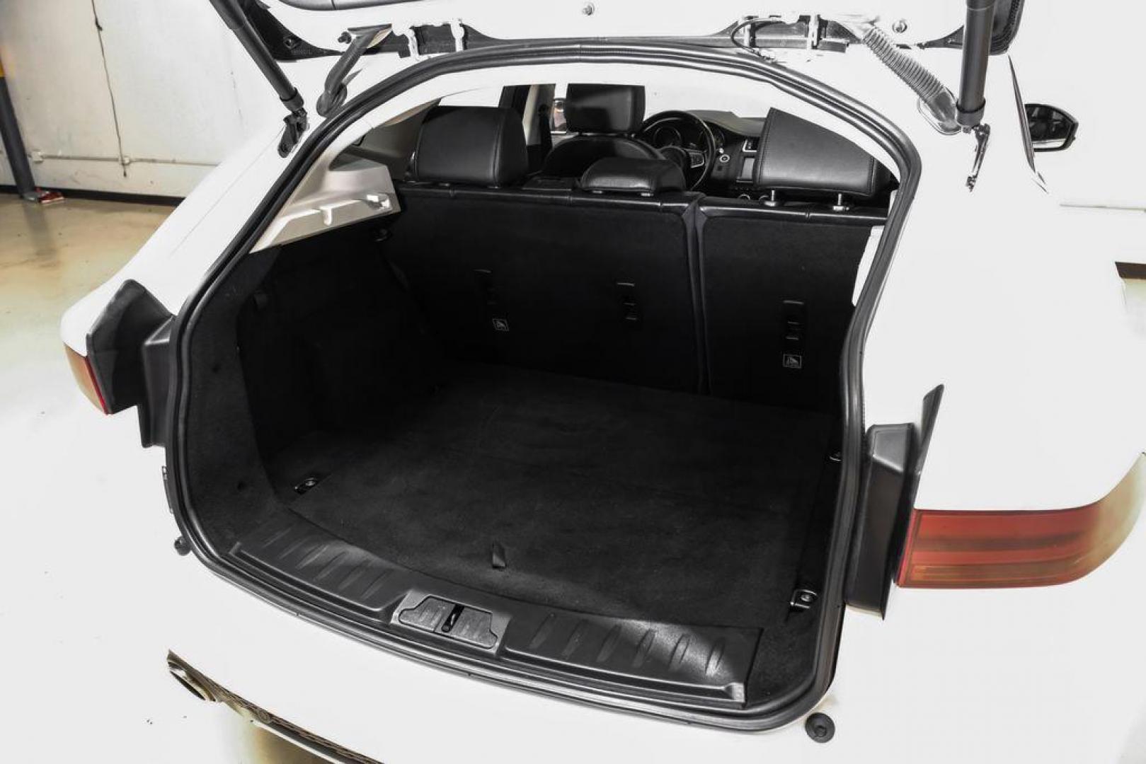 2018 Fuji White /Ebony/Ebony Jaguar E-PACE S (SADFJ2FX2J1) with an 2.0L I4 Turbocharged engine, Automatic transmission, located at 15300 Midway Rd., Addison, TX, 75001, (972) 702-0011, 32.958321, -96.838074 - HOME OF THE NO HAGGLE PRICE - WHOLESALE PRICES TO THE PUBLIC!! non smoker, E-PACE S, 4D Sport Utility, 2.0L I4 Turbocharged, 9-Speed Automatic, AWD, White, Ebony/Ebony Leather.<br><br>White 2018 Jaguar E-PACE S<br><br>21/28 City/Highway MPG<br><br>Awards:<br> * 2018 KBB.com Brand Image Awards<br><b - Photo#43