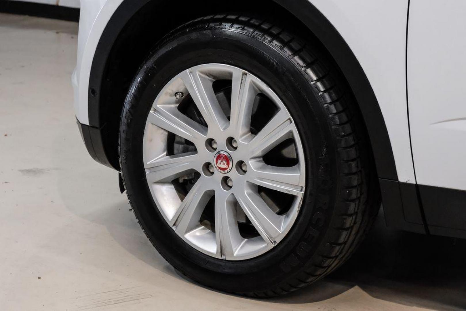 2018 Fuji White /Ebony/Ebony Jaguar E-PACE S (SADFJ2FX2J1) with an 2.0L I4 Turbocharged engine, Automatic transmission, located at 15300 Midway Rd., Addison, TX, 75001, (972) 702-0011, 32.958321, -96.838074 - HOME OF THE NO HAGGLE PRICE - WHOLESALE PRICES TO THE PUBLIC!! non smoker, E-PACE S, 4D Sport Utility, 2.0L I4 Turbocharged, 9-Speed Automatic, AWD, White, Ebony/Ebony Leather.<br><br>White 2018 Jaguar E-PACE S<br><br>21/28 City/Highway MPG<br><br>Awards:<br> * 2018 KBB.com Brand Image Awards<br><b - Photo#45