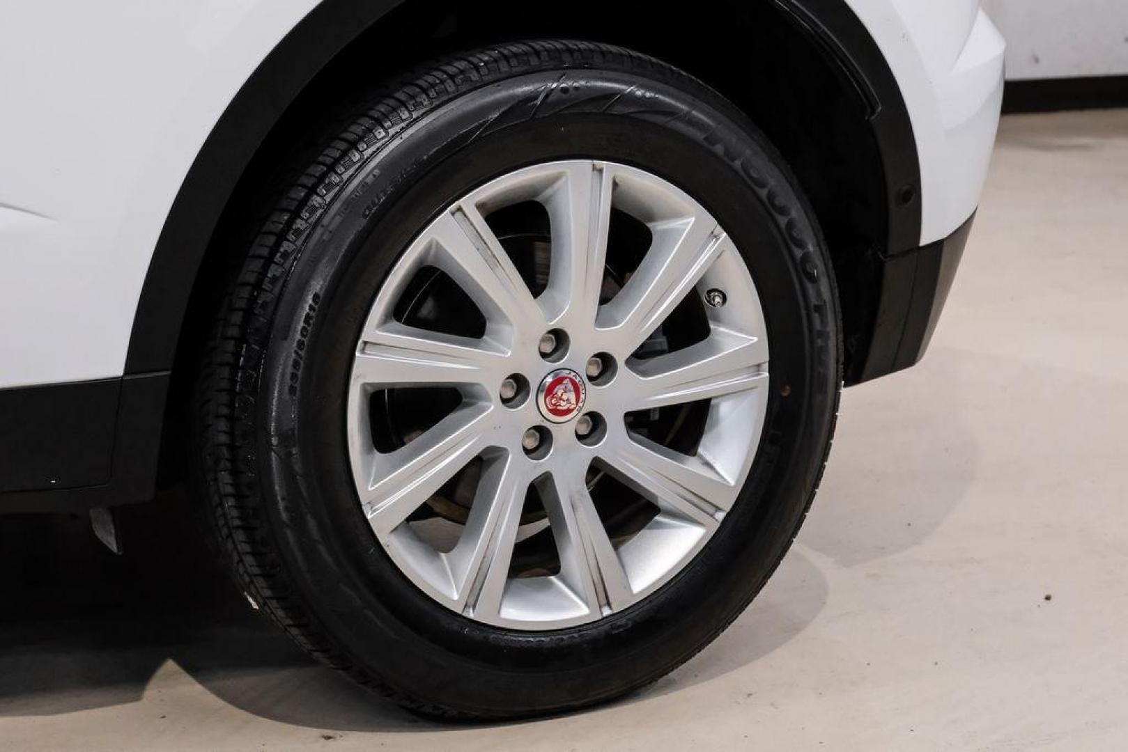 2018 Fuji White /Ebony/Ebony Jaguar E-PACE S (SADFJ2FX2J1) with an 2.0L I4 Turbocharged engine, Automatic transmission, located at 15300 Midway Rd., Addison, TX, 75001, (972) 702-0011, 32.958321, -96.838074 - HOME OF THE NO HAGGLE PRICE - WHOLESALE PRICES TO THE PUBLIC!! non smoker, E-PACE S, 4D Sport Utility, 2.0L I4 Turbocharged, 9-Speed Automatic, AWD, White, Ebony/Ebony Leather.<br><br>White 2018 Jaguar E-PACE S<br><br>21/28 City/Highway MPG<br><br>Awards:<br> * 2018 KBB.com Brand Image Awards<br><b - Photo#46