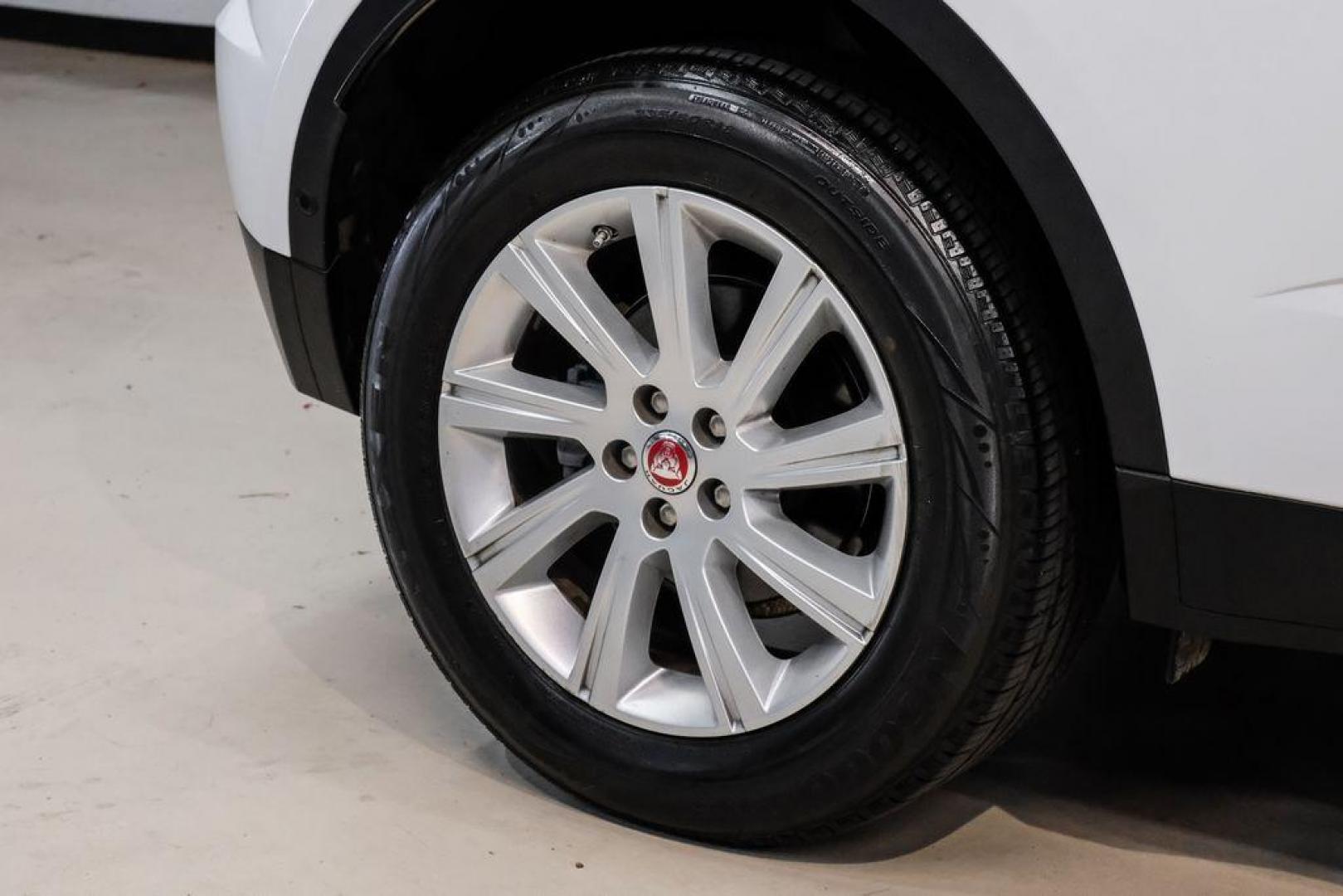 2018 Fuji White /Ebony/Ebony Jaguar E-PACE S (SADFJ2FX2J1) with an 2.0L I4 Turbocharged engine, Automatic transmission, located at 15300 Midway Rd., Addison, TX, 75001, (972) 702-0011, 32.958321, -96.838074 - HOME OF THE NO HAGGLE PRICE - WHOLESALE PRICES TO THE PUBLIC!! non smoker, E-PACE S, 4D Sport Utility, 2.0L I4 Turbocharged, 9-Speed Automatic, AWD, White, Ebony/Ebony Leather.<br><br>White 2018 Jaguar E-PACE S<br><br>21/28 City/Highway MPG<br><br>Awards:<br> * 2018 KBB.com Brand Image Awards<br><b - Photo#47