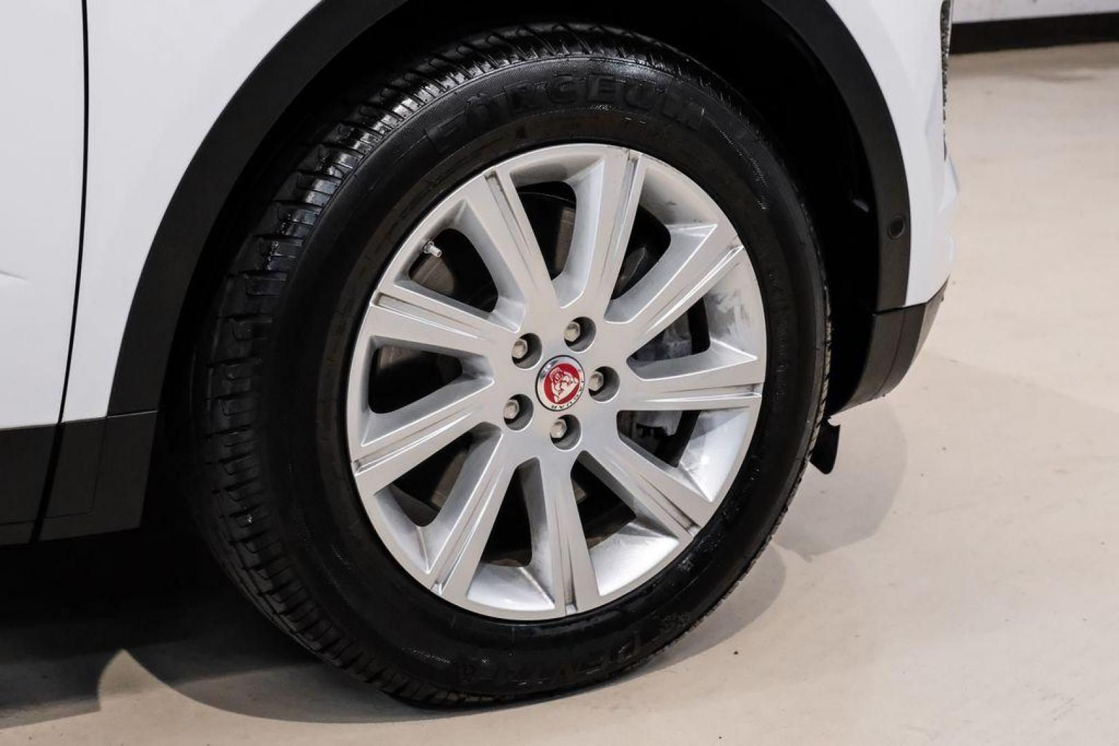 2018 Fuji White /Ebony/Ebony Jaguar E-PACE S (SADFJ2FX2J1) with an 2.0L I4 Turbocharged engine, Automatic transmission, located at 15300 Midway Rd., Addison, TX, 75001, (972) 702-0011, 32.958321, -96.838074 - HOME OF THE NO HAGGLE PRICE - WHOLESALE PRICES TO THE PUBLIC!! non smoker, E-PACE S, 4D Sport Utility, 2.0L I4 Turbocharged, 9-Speed Automatic, AWD, White, Ebony/Ebony Leather.<br><br>White 2018 Jaguar E-PACE S<br><br>21/28 City/Highway MPG<br><br>Awards:<br> * 2018 KBB.com Brand Image Awards<br><b - Photo#48