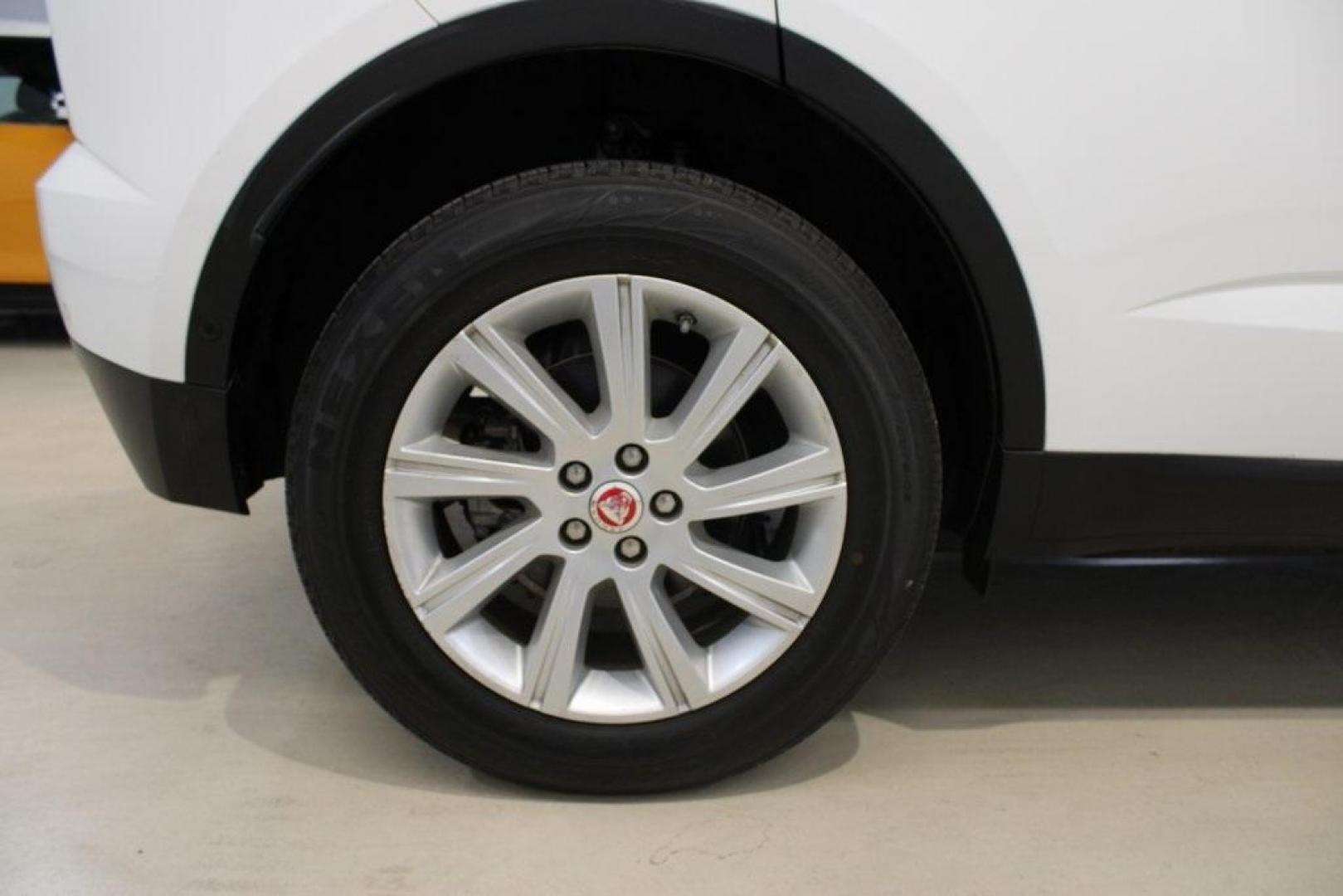 2018 Fuji White /Ebony/Ebony Jaguar E-PACE S (SADFJ2FX2J1) with an 2.0L I4 Turbocharged engine, Automatic transmission, located at 15300 Midway Rd., Addison, TX, 75001, (972) 702-0011, 32.958321, -96.838074 - HOME OF THE NO HAGGLE PRICE - WHOLESALE PRICES TO THE PUBLIC!! non smoker, E-PACE S, 4D Sport Utility, 2.0L I4 Turbocharged, 9-Speed Automatic, AWD, White, Ebony/Ebony Leather.<br><br>White 2018 Jaguar E-PACE S<br><br>21/28 City/Highway MPG<br><br>Awards:<br> * 2018 KBB.com Brand Image Awards<br><b - Photo#11