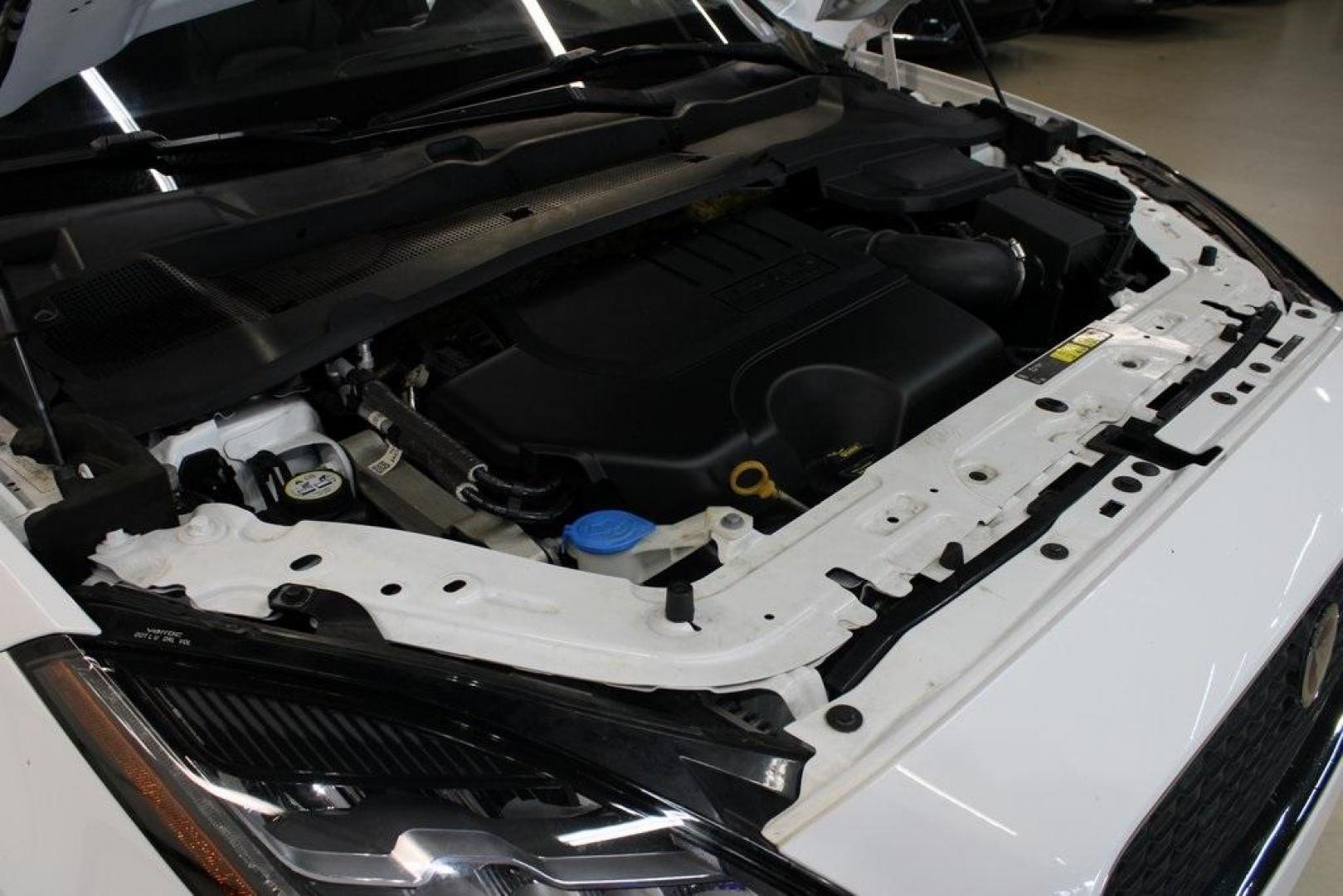 2018 Fuji White /Ebony/Ebony Jaguar E-PACE S (SADFJ2FX2J1) with an 2.0L I4 Turbocharged engine, Automatic transmission, located at 15300 Midway Rd., Addison, TX, 75001, (972) 702-0011, 32.958321, -96.838074 - HOME OF THE NO HAGGLE PRICE - WHOLESALE PRICES TO THE PUBLIC!! non smoker, E-PACE S, 4D Sport Utility, 2.0L I4 Turbocharged, 9-Speed Automatic, AWD, White, Ebony/Ebony Leather.<br><br>White 2018 Jaguar E-PACE S<br><br>21/28 City/Highway MPG<br><br>Awards:<br> * 2018 KBB.com Brand Image Awards<br><b - Photo#33