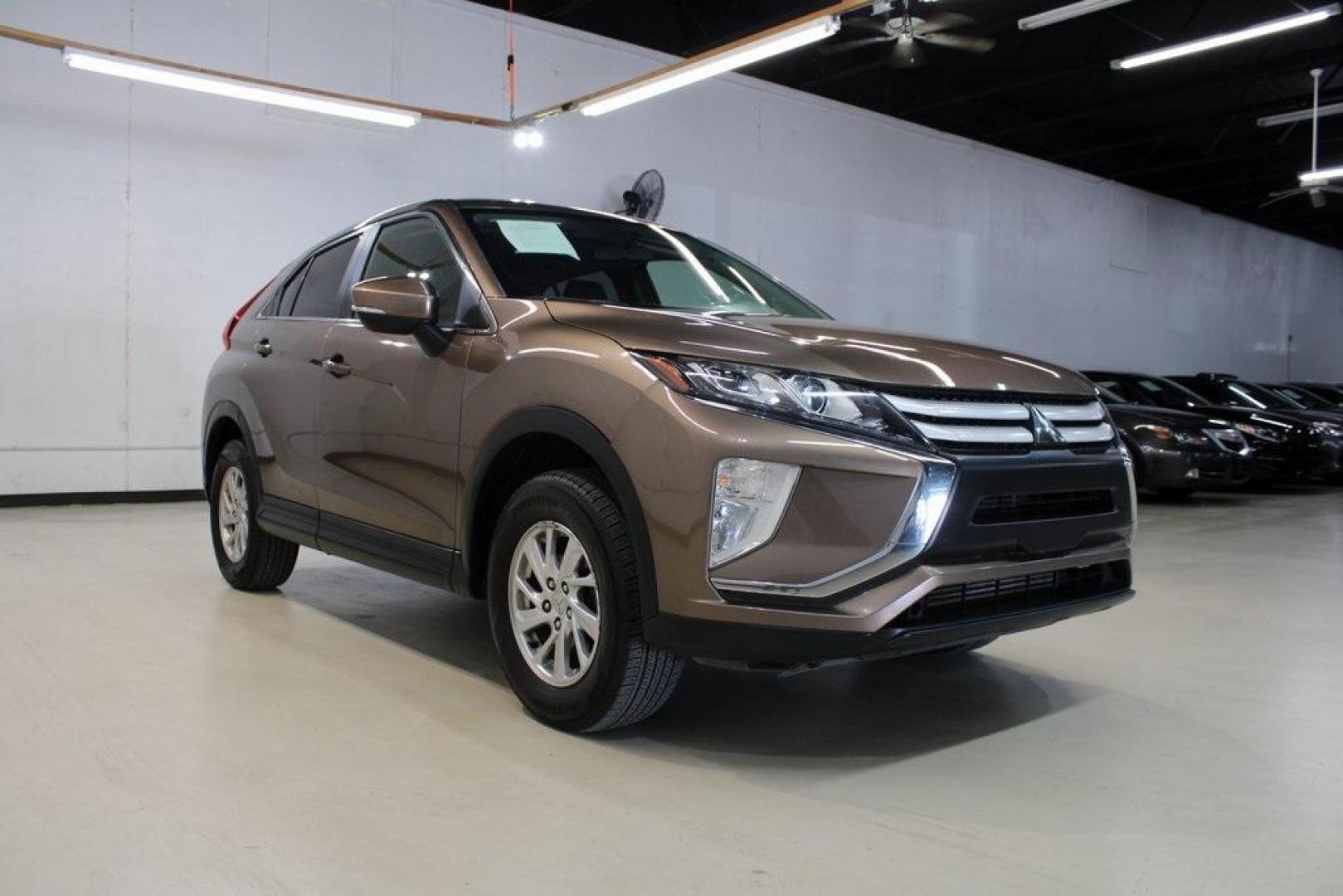 2018 Bronze Metallic /Black Mitsubishi Eclipse Cross ES (JA4AT3AA1JZ) with an 1.5L I4 Turbocharged DOHC 16V LEV3-ULEV70 152hp engine, CVT transmission, located at 15300 Midway Rd., Addison, TX, 75001, (972) 702-0011, 32.958321, -96.838074 - Introducing the 2018 Mitsubishi Eclipse Cross ES, now available at Midway Auto Group in Addison, Texas. This compact crossover seamlessly blends dynamic performance with contemporary design, making it an excellent choice for drivers seeking versatility and style.<br><br>Key Features:<br><br>Engine: - Photo#1