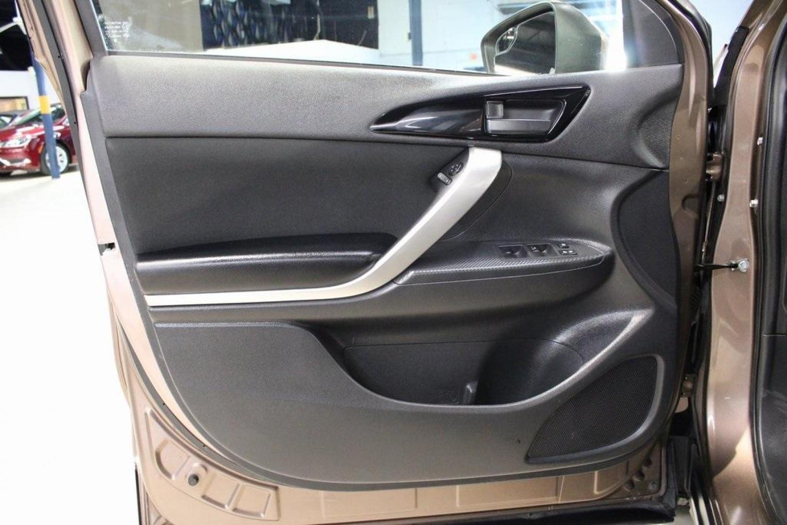 2018 Bronze Metallic /Black Mitsubishi Eclipse Cross ES (JA4AT3AA1JZ) with an 1.5L I4 Turbocharged DOHC 16V LEV3-ULEV70 152hp engine, CVT transmission, located at 15300 Midway Rd., Addison, TX, 75001, (972) 702-0011, 32.958321, -96.838074 - Introducing the 2018 Mitsubishi Eclipse Cross ES, now available at Midway Auto Group in Addison, Texas. This compact crossover seamlessly blends dynamic performance with contemporary design, making it an excellent choice for drivers seeking versatility and style.<br><br>Key Features:<br><br>Engine: - Photo#25