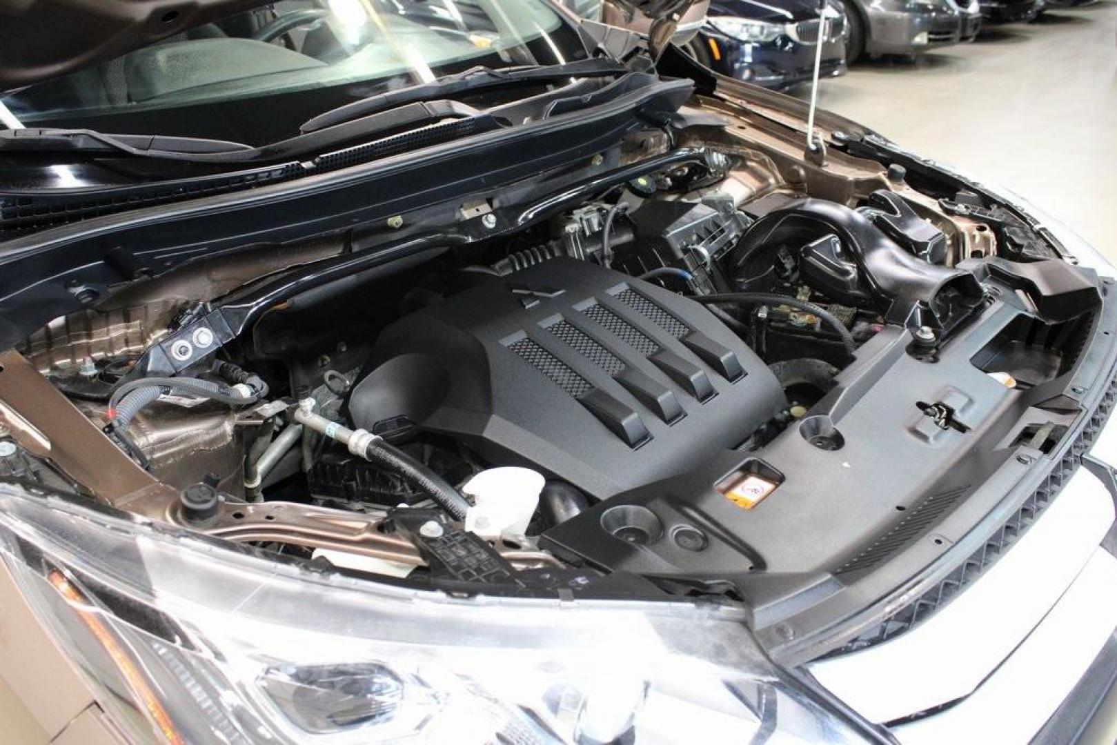 2018 Bronze Metallic /Black Mitsubishi Eclipse Cross ES (JA4AT3AA1JZ) with an 1.5L I4 Turbocharged DOHC 16V LEV3-ULEV70 152hp engine, CVT transmission, located at 15300 Midway Rd., Addison, TX, 75001, (972) 702-0011, 32.958321, -96.838074 - Introducing the 2018 Mitsubishi Eclipse Cross ES, now available at Midway Auto Group in Addison, Texas. This compact crossover seamlessly blends dynamic performance with contemporary design, making it an excellent choice for drivers seeking versatility and style.<br><br>Key Features:<br><br>Engine: - Photo#28