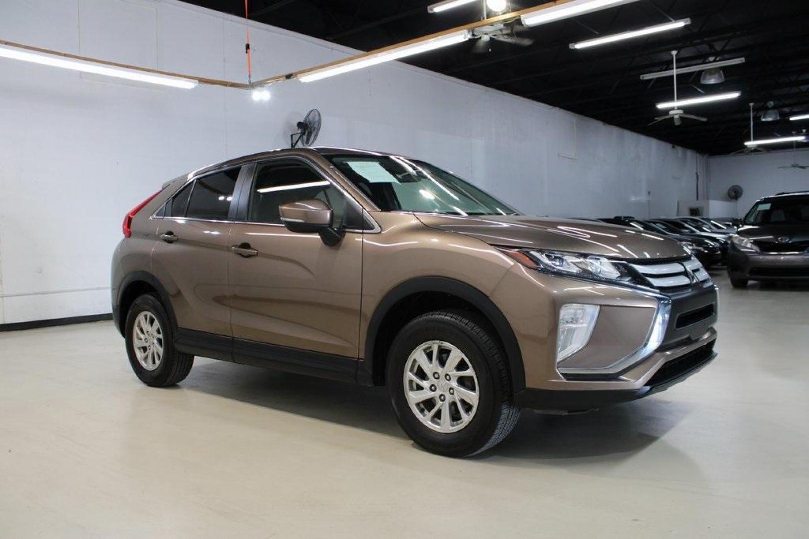 2018 Bronze Metallic /Black Mitsubishi Eclipse Cross ES (JA4AT3AA1JZ) with an 1.5L I4 Turbocharged DOHC 16V LEV3-ULEV70 152hp engine, CVT transmission, located at 15300 Midway Rd., Addison, TX, 75001, (972) 702-0011, 32.958321, -96.838074 - Introducing the 2018 Mitsubishi Eclipse Cross ES, now available at Midway Auto Group in Addison, Texas. This compact crossover seamlessly blends dynamic performance with contemporary design, making it an excellent choice for drivers seeking versatility and style.<br><br>Key Features:<br><br>Engine: - Photo#6