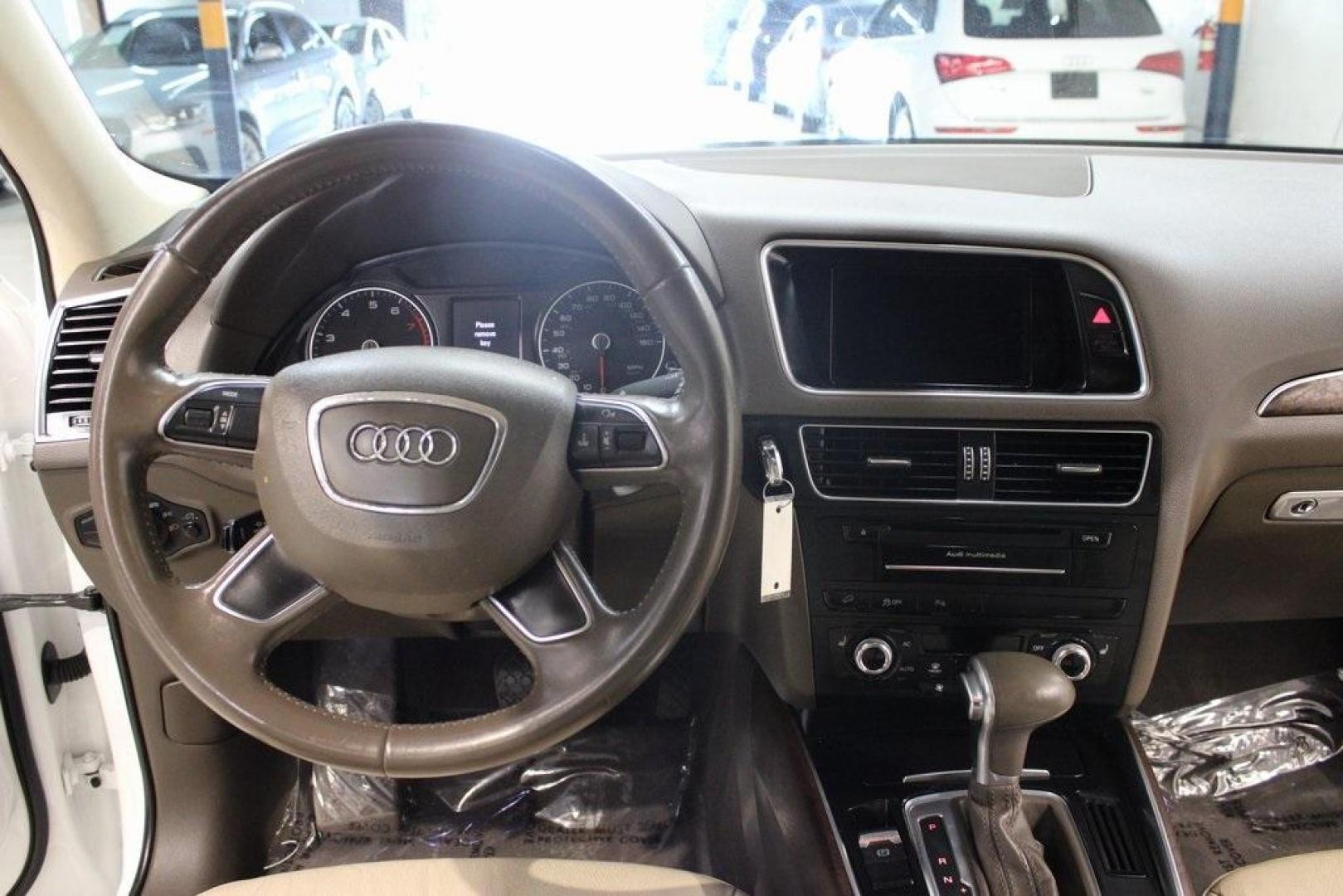 2014 Ibis White /Pistachio Beige Audi Q5 2.0T Premium Plus (WA1LFAFP4EA) with an 2.0L I4 TFSI Direct Injection DOHC engine, Automatic transmission, located at 15300 Midway Rd., Addison, TX, 75001, (972) 702-0011, 32.958321, -96.838074 - Introducing the 2014 Audi Q5 2.0T Premium Plus quattro, now available at Midway Auto Group in Addison, Texas. This luxury compact SUV seamlessly blends performance, sophistication, and advanced technology, making it an excellent choice for discerning drivers seeking versatility and style.<br><br>Key - Photo#19