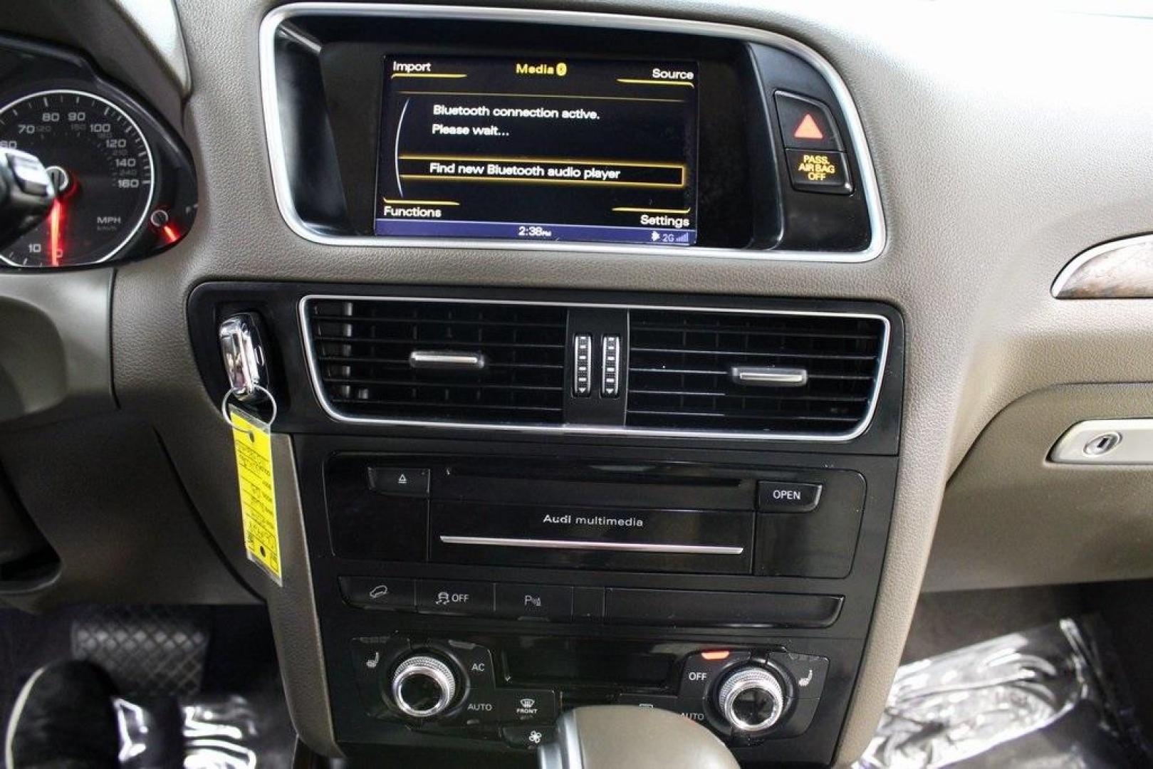 2014 Ibis White /Pistachio Beige Audi Q5 2.0T Premium Plus (WA1LFAFP4EA) with an 2.0L I4 TFSI Direct Injection DOHC engine, Automatic transmission, located at 15300 Midway Rd., Addison, TX, 75001, (972) 702-0011, 32.958321, -96.838074 - Introducing the 2014 Audi Q5 2.0T Premium Plus quattro, now available at Midway Auto Group in Addison, Texas. This luxury compact SUV seamlessly blends performance, sophistication, and advanced technology, making it an excellent choice for discerning drivers seeking versatility and style.<br><br>Key - Photo#23