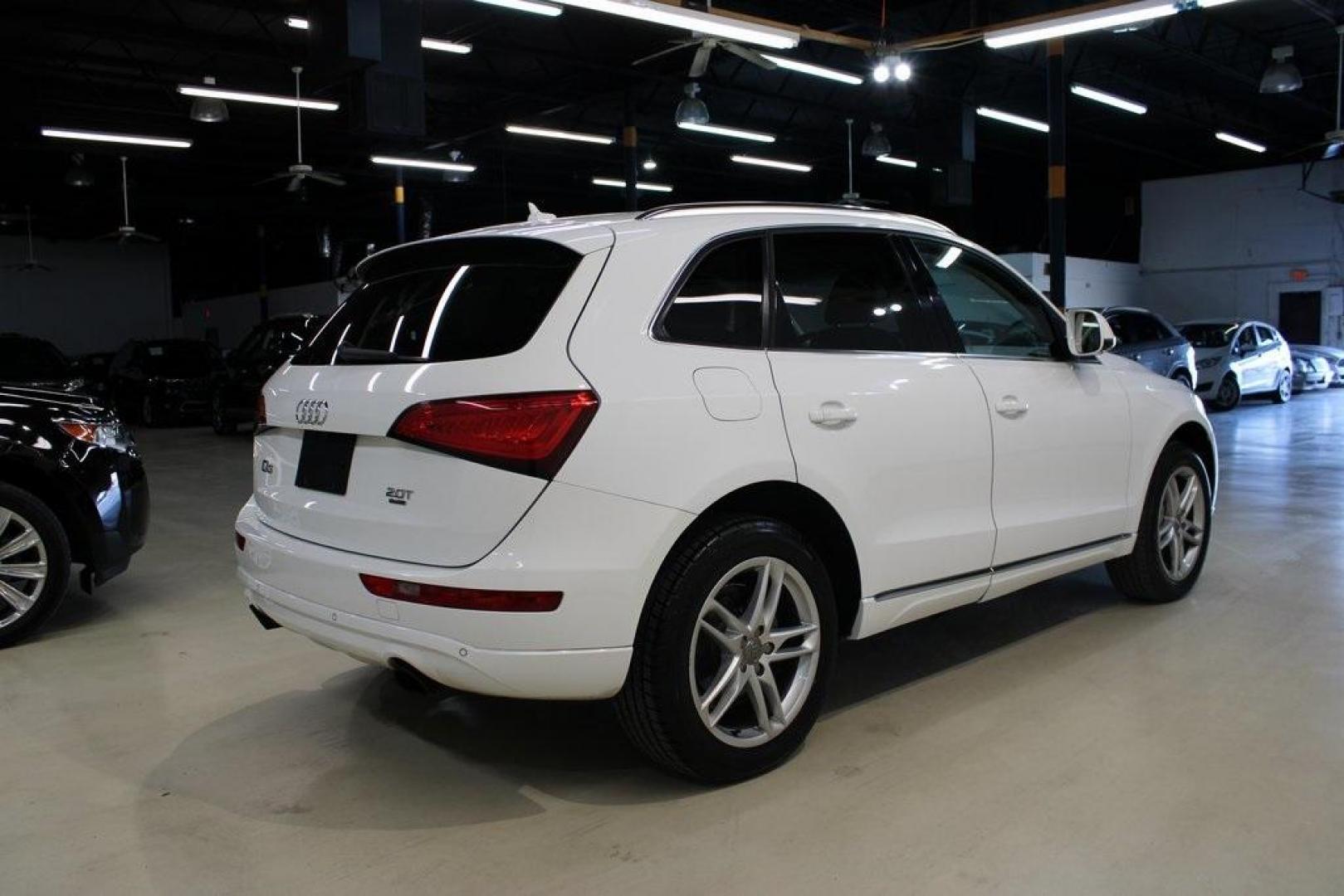 2014 Ibis White /Pistachio Beige Audi Q5 2.0T Premium Plus (WA1LFAFP4EA) with an 2.0L I4 TFSI Direct Injection DOHC engine, Automatic transmission, located at 15300 Midway Rd., Addison, TX, 75001, (972) 702-0011, 32.958321, -96.838074 - Introducing the 2014 Audi Q5 2.0T Premium Plus quattro, now available at Midway Auto Group in Addison, Texas. This luxury compact SUV seamlessly blends performance, sophistication, and advanced technology, making it an excellent choice for discerning drivers seeking versatility and style.<br><br>Key - Photo#2