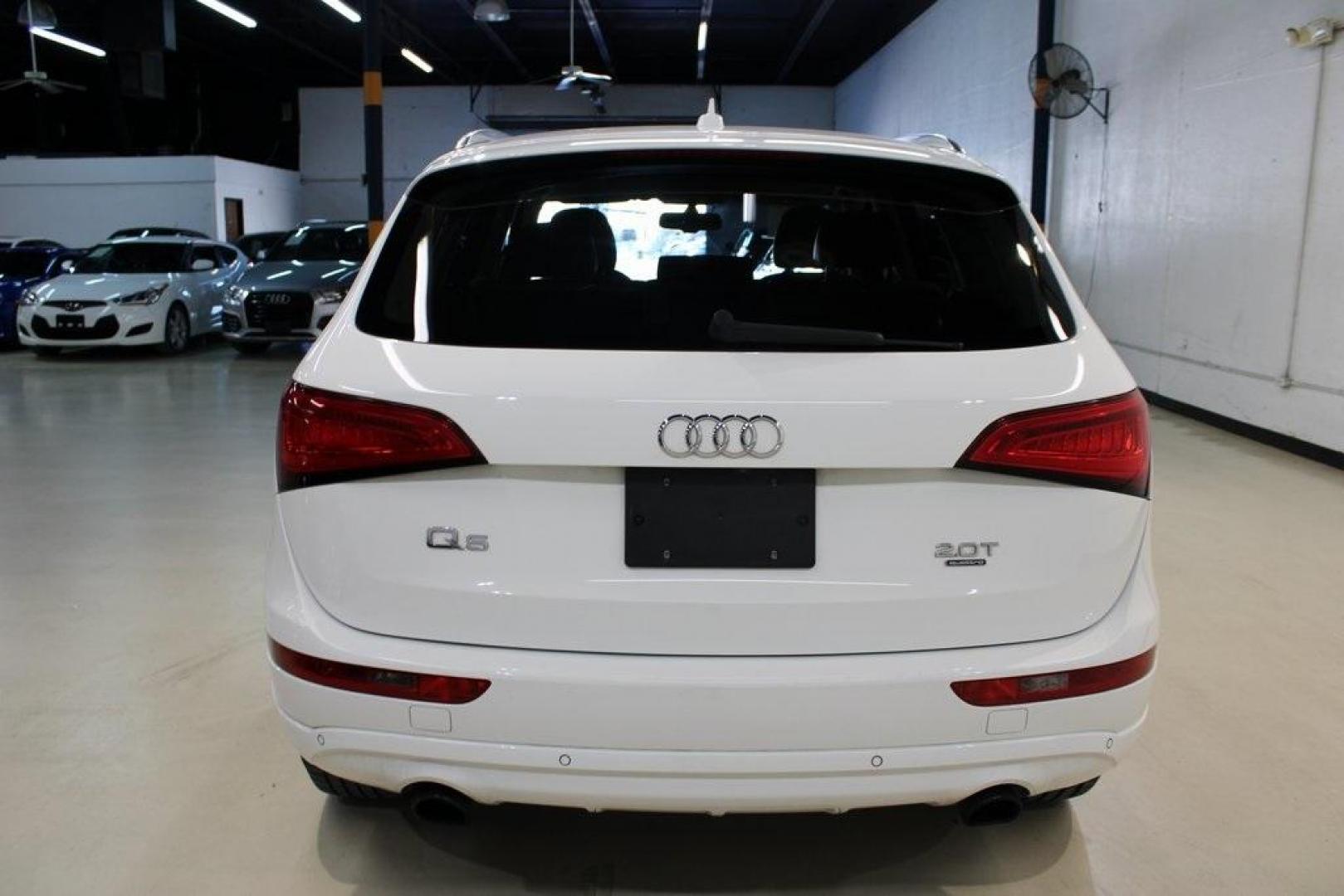 2014 Ibis White /Pistachio Beige Audi Q5 2.0T Premium Plus (WA1LFAFP4EA) with an 2.0L I4 TFSI Direct Injection DOHC engine, Automatic transmission, located at 15300 Midway Rd., Addison, TX, 75001, (972) 702-0011, 32.958321, -96.838074 - Introducing the 2014 Audi Q5 2.0T Premium Plus quattro, now available at Midway Auto Group in Addison, Texas. This luxury compact SUV seamlessly blends performance, sophistication, and advanced technology, making it an excellent choice for discerning drivers seeking versatility and style.<br><br>Key - Photo#7