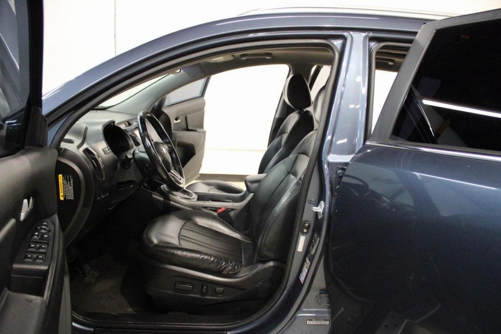 2016 Twilight Blue /Black Kia Sportage SX (KNDPC3A6XG7) with an 2.0L I4 DGI Turbocharged engine, Automatic transmission, located at 15300 Midway Rd., Addison, TX, 75001, (972) 702-0011, 32.958321, -96.838074 - Introducing the 2016 Kia Sportage SX, now available at Midway Auto Group in Addison, Texas. This compact crossover seamlessly blends sporty performance with modern features, making it an excellent choice for those seeking versatility and style.<br><br>Key Features:<br><br>Engine: 2.0L Turbocharged I - Photo#10