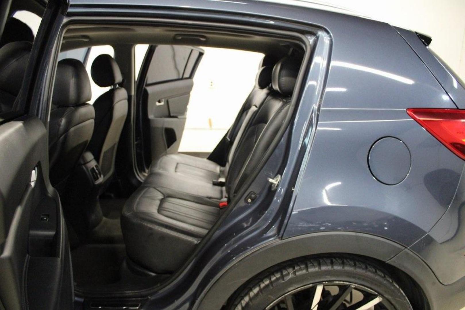 2016 Twilight Blue /Black Kia Sportage SX (KNDPC3A6XG7) with an 2.0L I4 DGI Turbocharged engine, Automatic transmission, located at 15300 Midway Rd., Addison, TX, 75001, (972) 702-0011, 32.958321, -96.838074 - Introducing the 2016 Kia Sportage SX, now available at Midway Auto Group in Addison, Texas. This compact crossover seamlessly blends sporty performance with modern features, making it an excellent choice for those seeking versatility and style.<br><br>Key Features:<br><br>Engine: 2.0L Turbocharged I - Photo#13