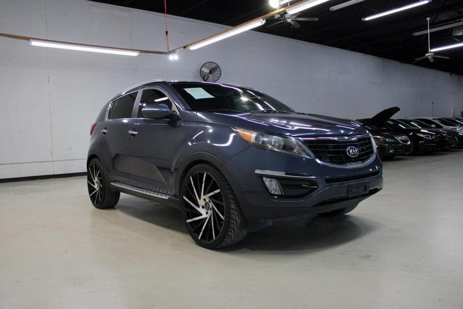 2016 Twilight Blue /Black Kia Sportage SX (KNDPC3A6XG7) with an 2.0L I4 DGI Turbocharged engine, Automatic transmission, located at 15300 Midway Rd., Addison, TX, 75001, (972) 702-0011, 32.958321, -96.838074 - Introducing the 2016 Kia Sportage SX, now available at Midway Auto Group in Addison, Texas. This compact crossover seamlessly blends sporty performance with modern features, making it an excellent choice for those seeking versatility and style.<br><br>Key Features:<br><br>Engine: 2.0L Turbocharged I - Photo#1