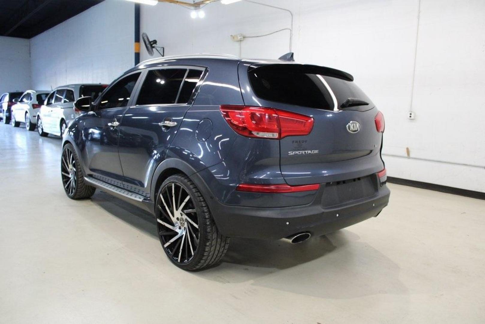 2016 Twilight Blue /Black Kia Sportage SX (KNDPC3A6XG7) with an 2.0L I4 DGI Turbocharged engine, Automatic transmission, located at 15300 Midway Rd., Addison, TX, 75001, (972) 702-0011, 32.958321, -96.838074 - Introducing the 2016 Kia Sportage SX, now available at Midway Auto Group in Addison, Texas. This compact crossover seamlessly blends sporty performance with modern features, making it an excellent choice for those seeking versatility and style.<br><br>Key Features:<br><br>Engine: 2.0L Turbocharged I - Photo#2