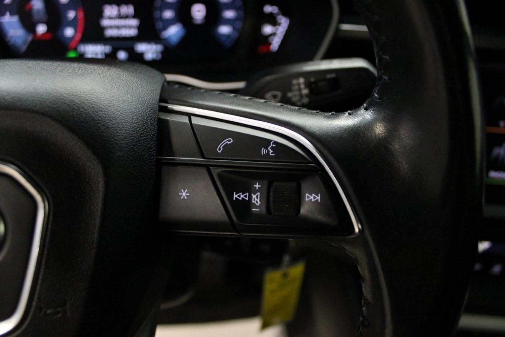 2020 White /Black Audi Q3 Premium (WA1AECF34L1) with an 2.0L 4-Cylinder TFSI engine, Automatic transmission, located at 15300 Midway Rd., Addison, TX, 75001, (972) 702-0011, 32.958321, -96.838074 - HOME OF THE NO HAGGLE PRICE - WHOLESALE PRICES TO THE PUBLIC!! Q3 Premium quattro, 4D Sport Utility, 2.0L 4-Cylinder TFSI, 8-Speed Automatic with Tiptronic, quattro, White, Leather.<br><br>White 2020 Audi Q3 Premium<br><br>19/27 City/Highway MPG<br><br>Awards:<br> * 2020 KBB.com Best Buy Awards<br> - Photo#25