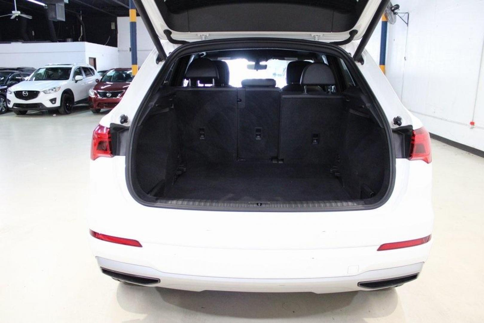 2020 White /Black Audi Q3 Premium (WA1AECF34L1) with an 2.0L 4-Cylinder TFSI engine, Automatic transmission, located at 15300 Midway Rd., Addison, TX, 75001, (972) 702-0011, 32.958321, -96.838074 - HOME OF THE NO HAGGLE PRICE - WHOLESALE PRICES TO THE PUBLIC!! Q3 Premium quattro, 4D Sport Utility, 2.0L 4-Cylinder TFSI, 8-Speed Automatic with Tiptronic, quattro, White, Leather.<br><br>White 2020 Audi Q3 Premium<br><br>19/27 City/Highway MPG<br><br>Awards:<br> * 2020 KBB.com Best Buy Awards<br> - Photo#8