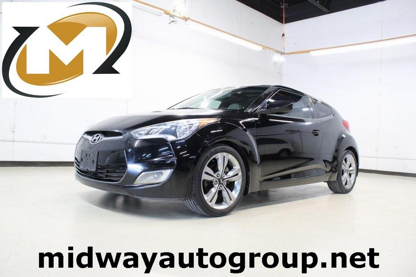 2012 Ultra Black /Gray Hyundai Veloster Base (KMHTC6ADXCU) with an 1.6L 4-Cylinder DGI DOHC engine, Automatic transmission, located at 15300 Midway Rd., Addison, TX, 75001, (972) 702-0011, 32.958321, -96.838074 - Introducing the 2012 Hyundai Veloster, now available at Midway Auto Group in Addison, Texas. This innovative hatchback combines sporty design, advanced technology, and impressive fuel efficiency, making it an excellent choice for drivers seeking both style and practicality.<br><br>Key Features:<br>< - Photo#0