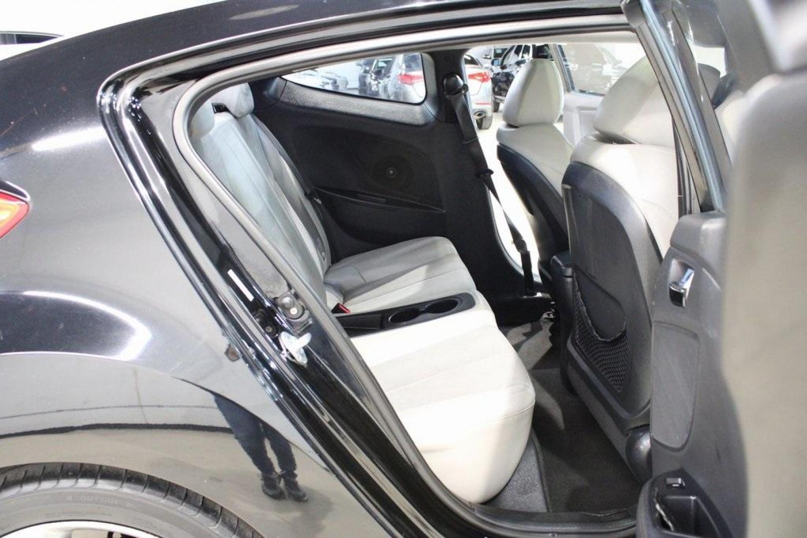 2012 Ultra Black /Gray Hyundai Veloster Base (KMHTC6ADXCU) with an 1.6L 4-Cylinder DGI DOHC engine, Automatic transmission, located at 15300 Midway Rd., Addison, TX, 75001, (972) 702-0011, 32.958321, -96.838074 - Introducing the 2012 Hyundai Veloster, now available at Midway Auto Group in Addison, Texas. This innovative hatchback combines sporty design, advanced technology, and impressive fuel efficiency, making it an excellent choice for drivers seeking both style and practicality.<br><br>Key Features:<br>< - Photo#16