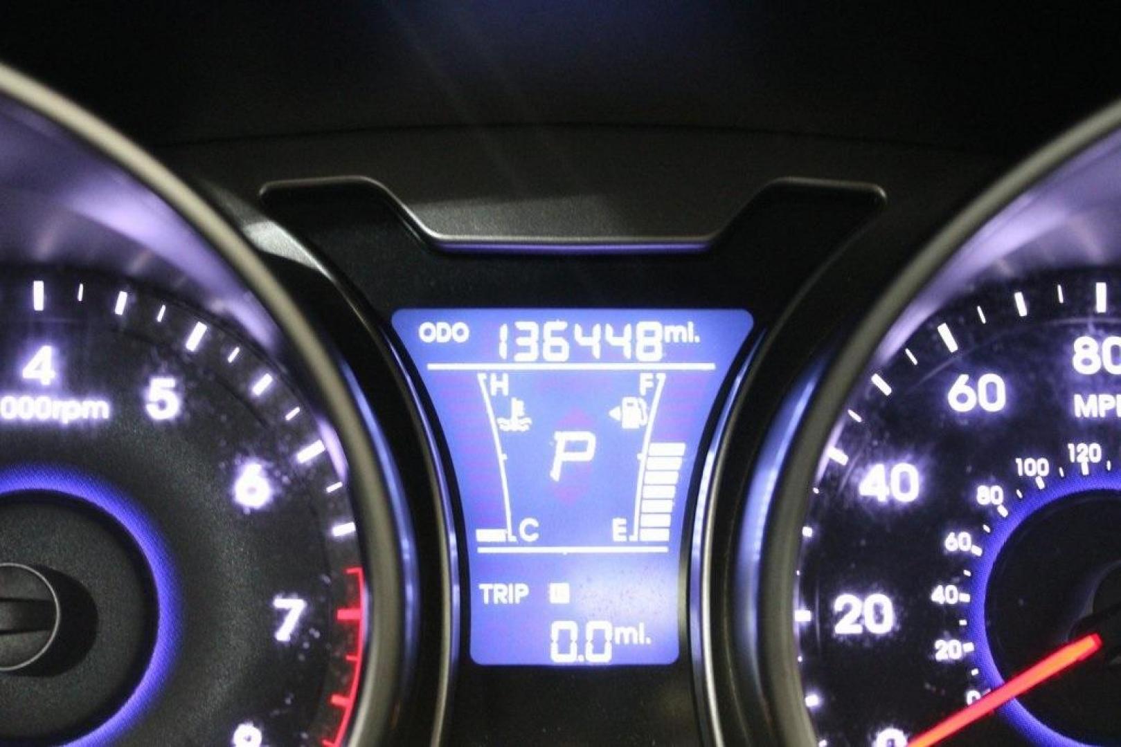 2012 Ultra Black /Gray Hyundai Veloster Base (KMHTC6ADXCU) with an 1.6L 4-Cylinder DGI DOHC engine, Automatic transmission, located at 15300 Midway Rd., Addison, TX, 75001, (972) 702-0011, 32.958321, -96.838074 - Introducing the 2012 Hyundai Veloster, now available at Midway Auto Group in Addison, Texas. This innovative hatchback combines sporty design, advanced technology, and impressive fuel efficiency, making it an excellent choice for drivers seeking both style and practicality.<br><br>Key Features:<br>< - Photo#21